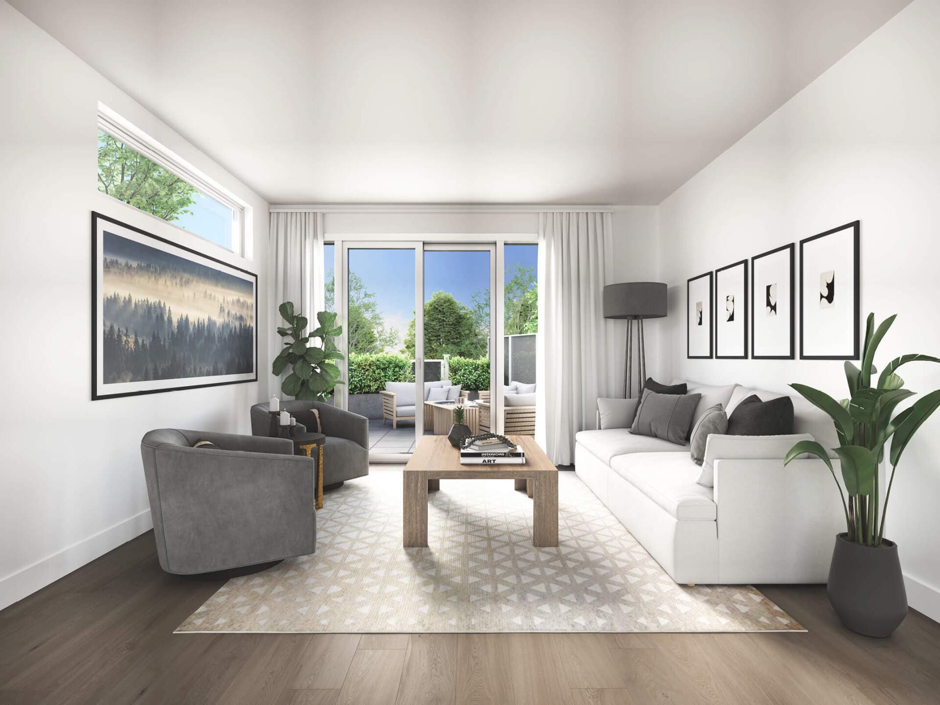EIGHT – A living room with a white sectional sofa, two gray swivel chairs, a wood coffee table, and a framed forest photograph on the wall.