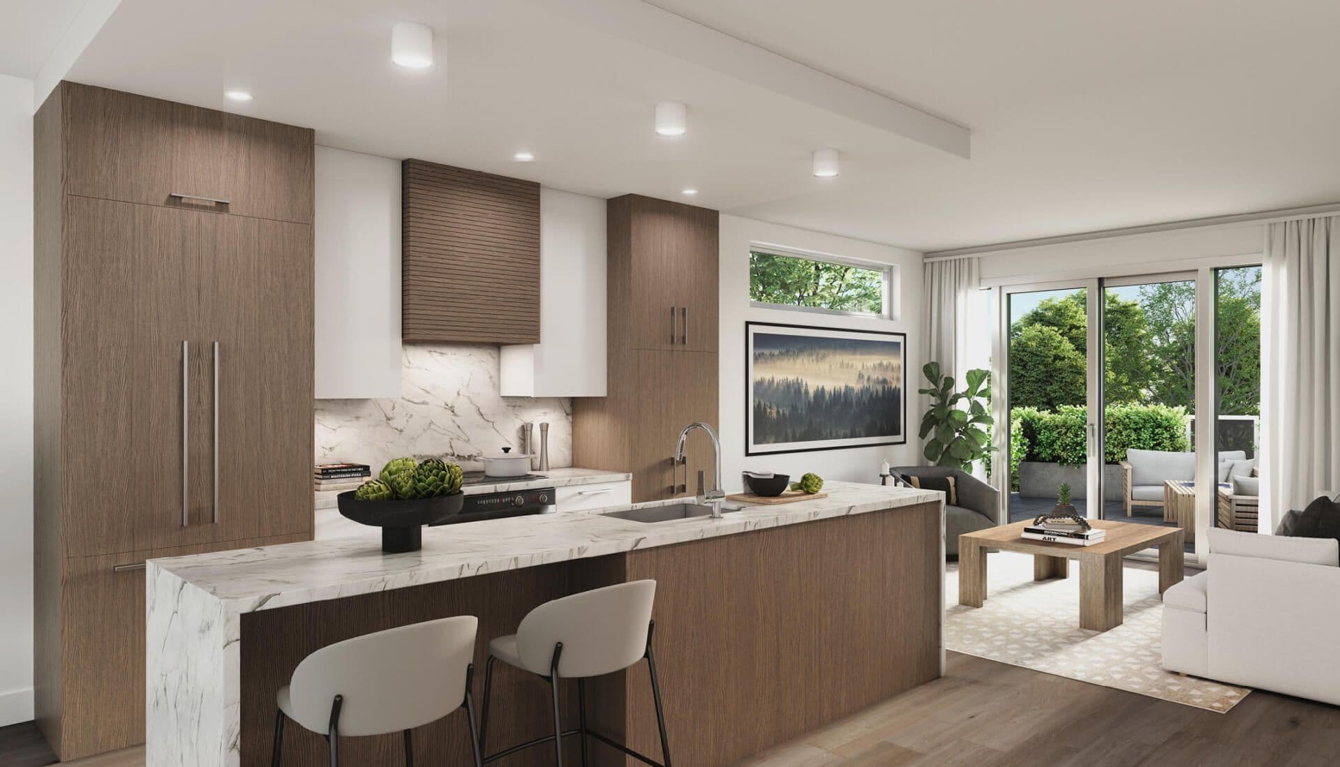 EIGHT – An open kitchen and living area with white marble waterfall island, wood cabinetry, and the same forest artwork visible in the living room beyond.