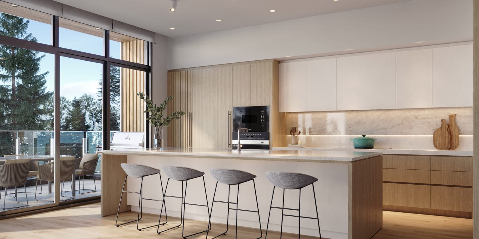 Wildwood at Uplands – Kitchen with light wood cabinetry, marble-look backsplash, an island with gray bar stools, and floor-to-ceiling windows opening to a balcony with forest view.