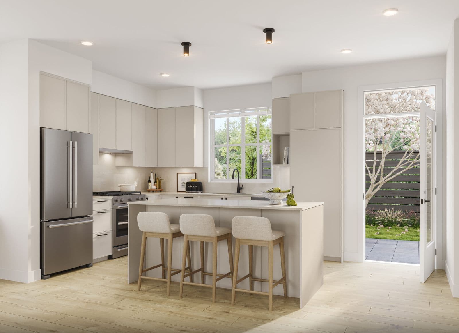 Latimer Walk – Kitchen with light cabinetry, a stainless steel refrigerator, and a French door leading to a backyard patio.