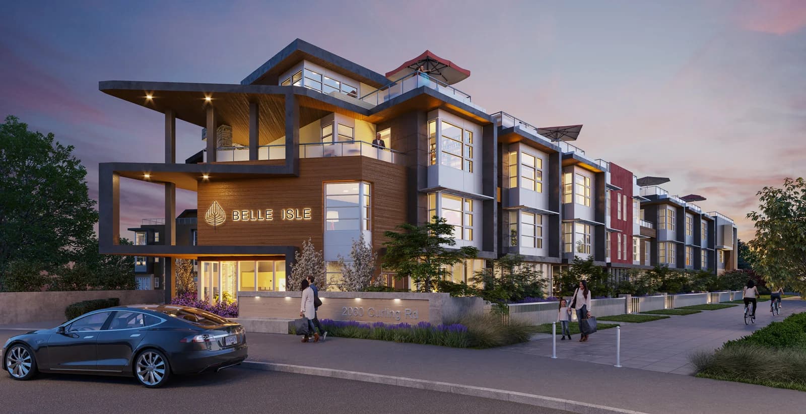 Belle Isle North – A twilight street-level rendering of a modern, multi-story residential building featuring dark paneling, warm wood siding, oversized glass windows, and rooftop decks equipped with patio furniture and red umbrellas. Pedestrians walk along the manicured sidewalk beside landscaped garden beds, a illuminated project sign, and a parked sedan under a purple-and-orange sunset sky.