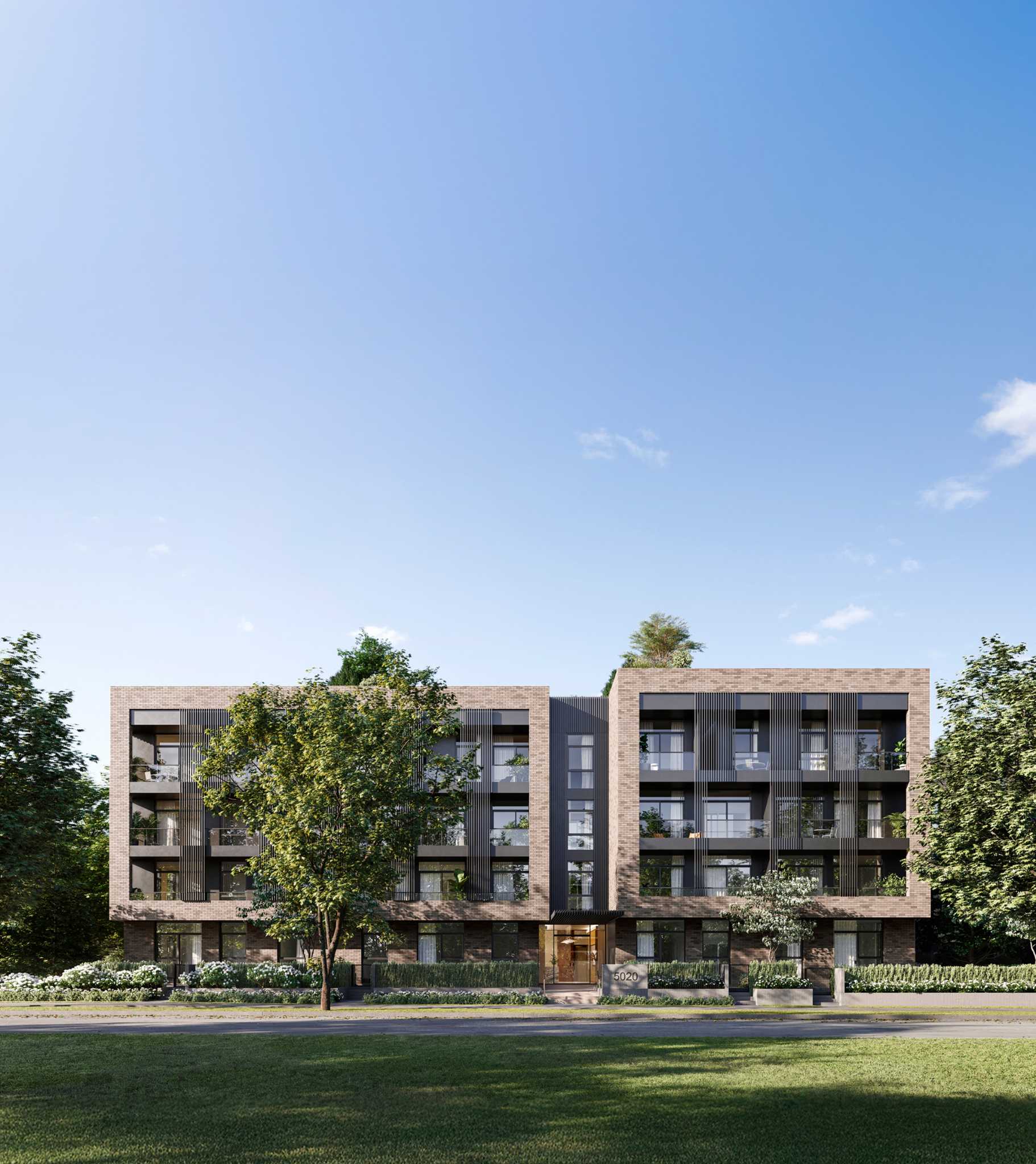 Ashleigh Oakridge Condos – Street-level rendering of a mid-rise brick condo building with vertical fin balcony screens, address numbered 5020.