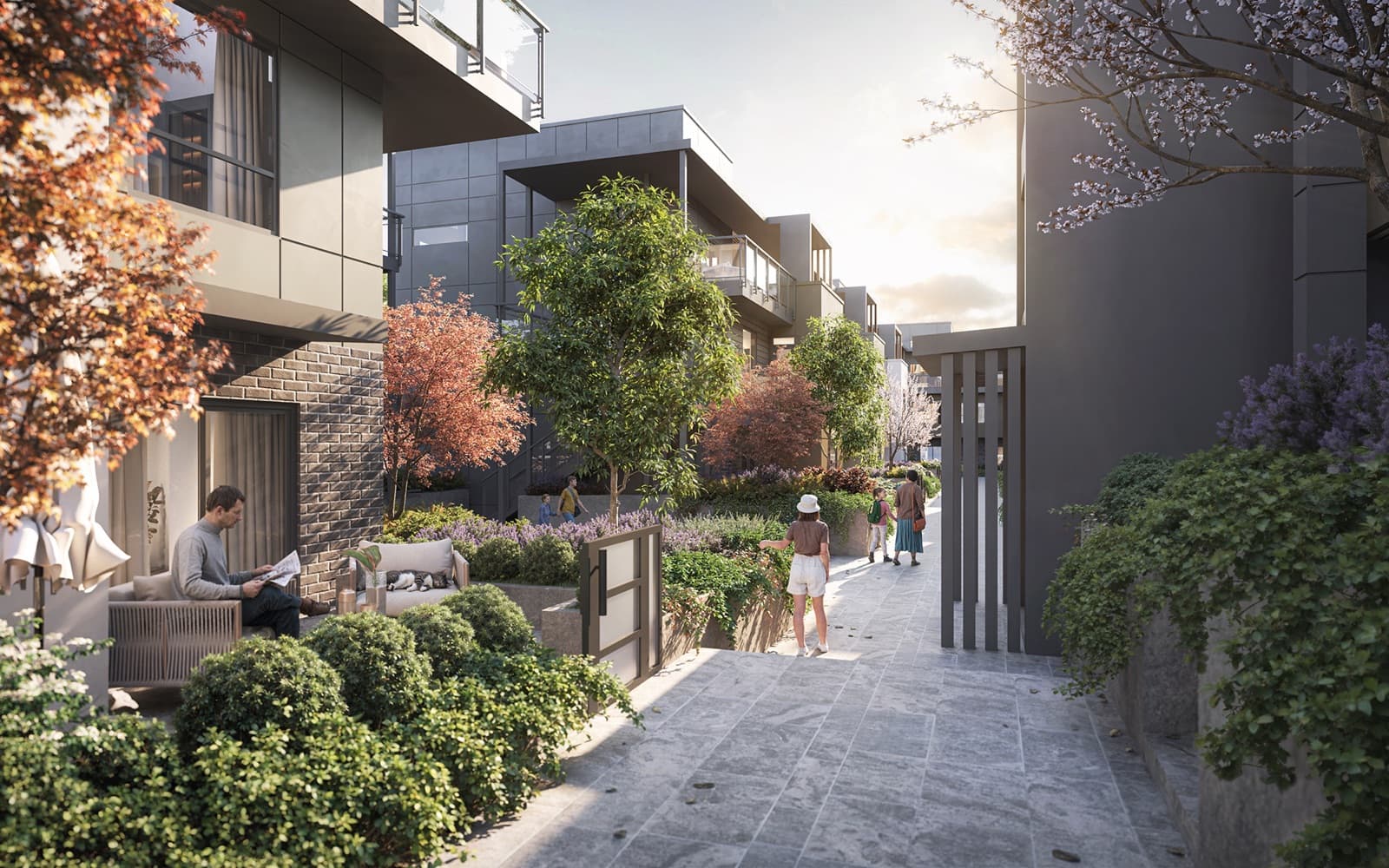 Soul – Rendering of a landscaped courtyard pathway between modern dark-clad townhomes with cherry blossom trees and residents walking through.