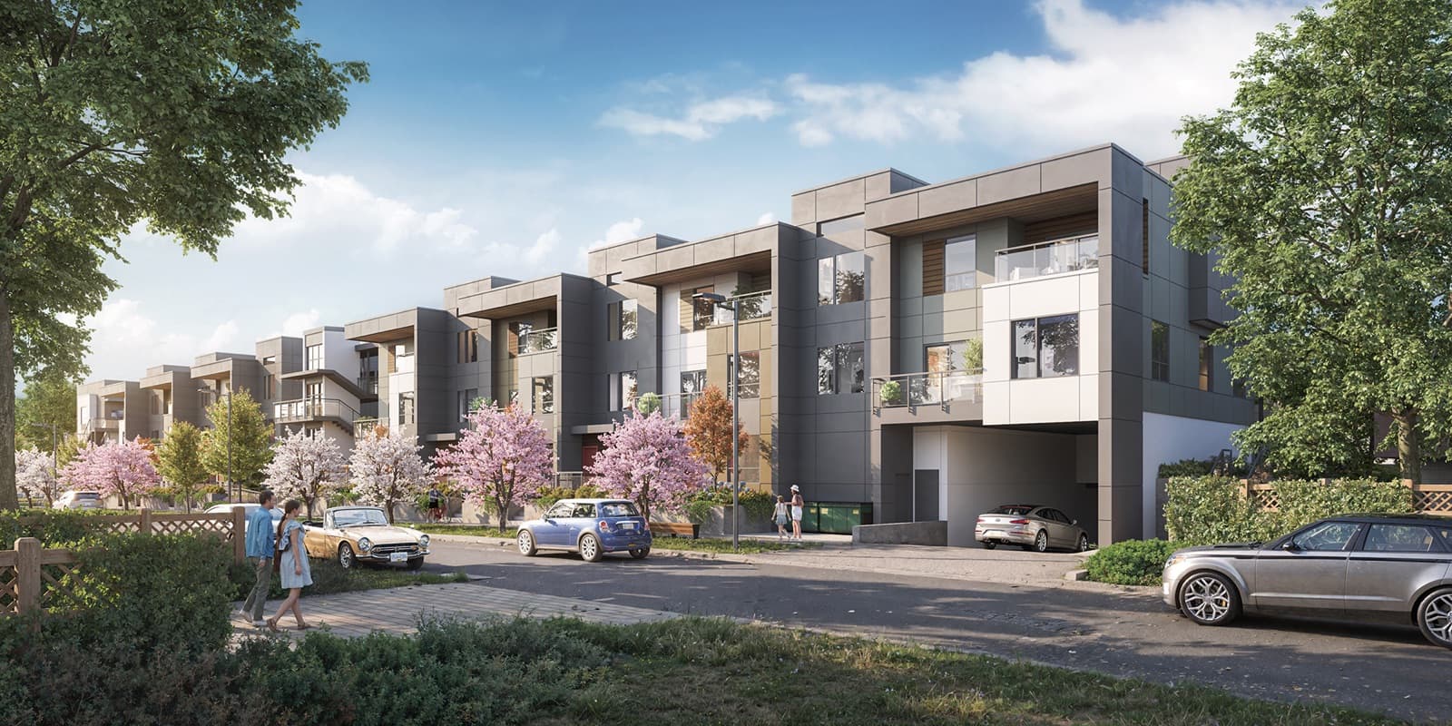 Soul – Rendering of contemporary grey and white townhomes with cherry blossom trees, a driveway, and parked cars along the street.