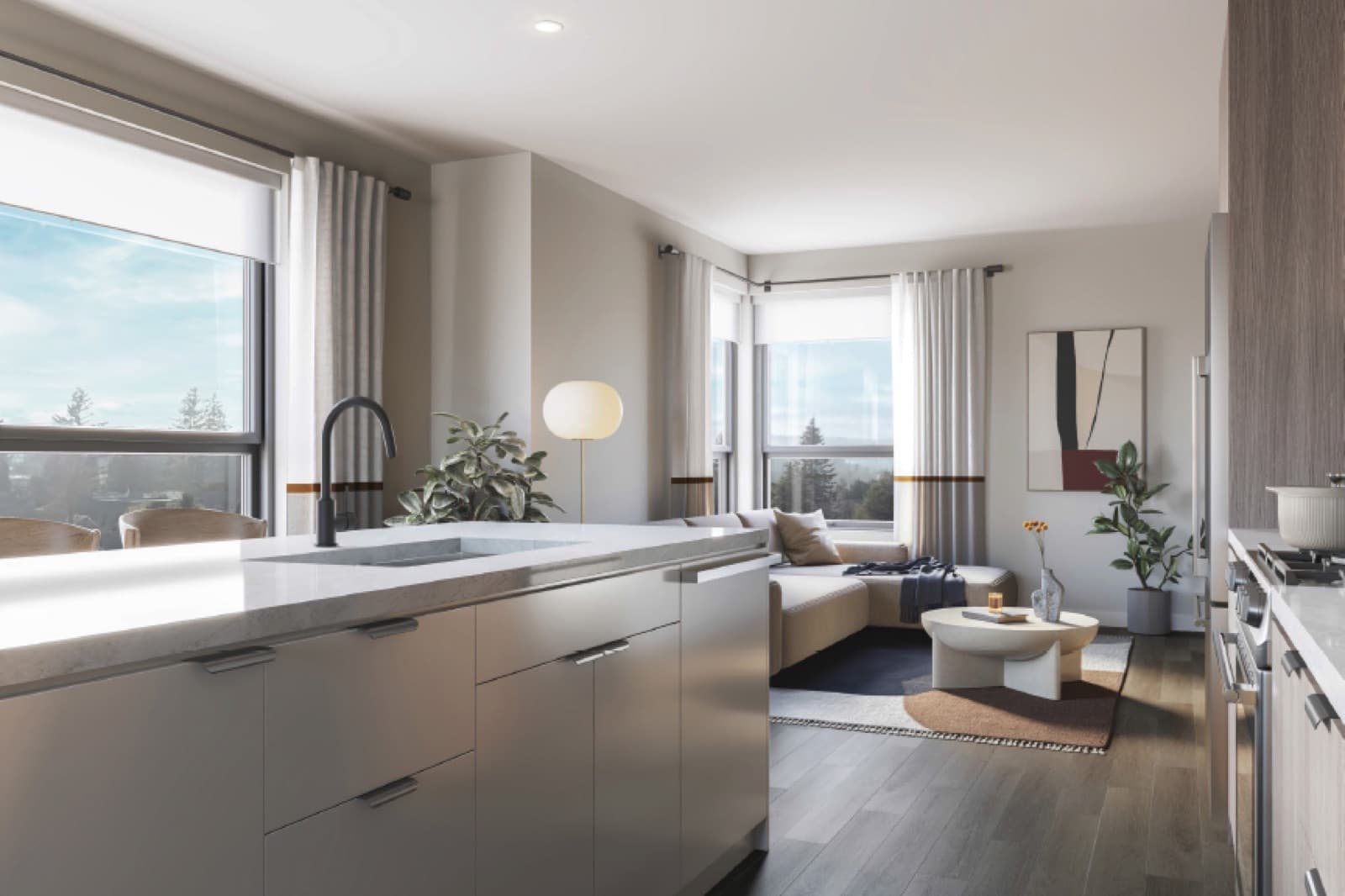 Soul – Open kitchen and living room with a grey stone island, black fixtures, a beige sectional sofa, and large windows with a treed view.