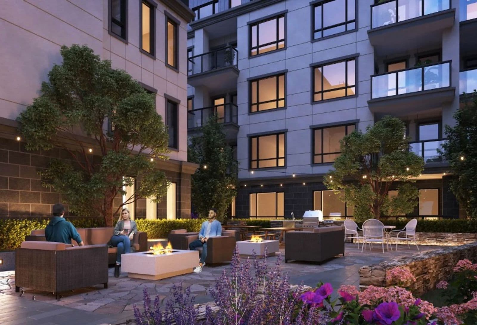 Bastille – Evening rendering of a courtyard between two residential buildings with lounge seating around two fire tables, a communal BBQ and dining area, and string lights in the trees.