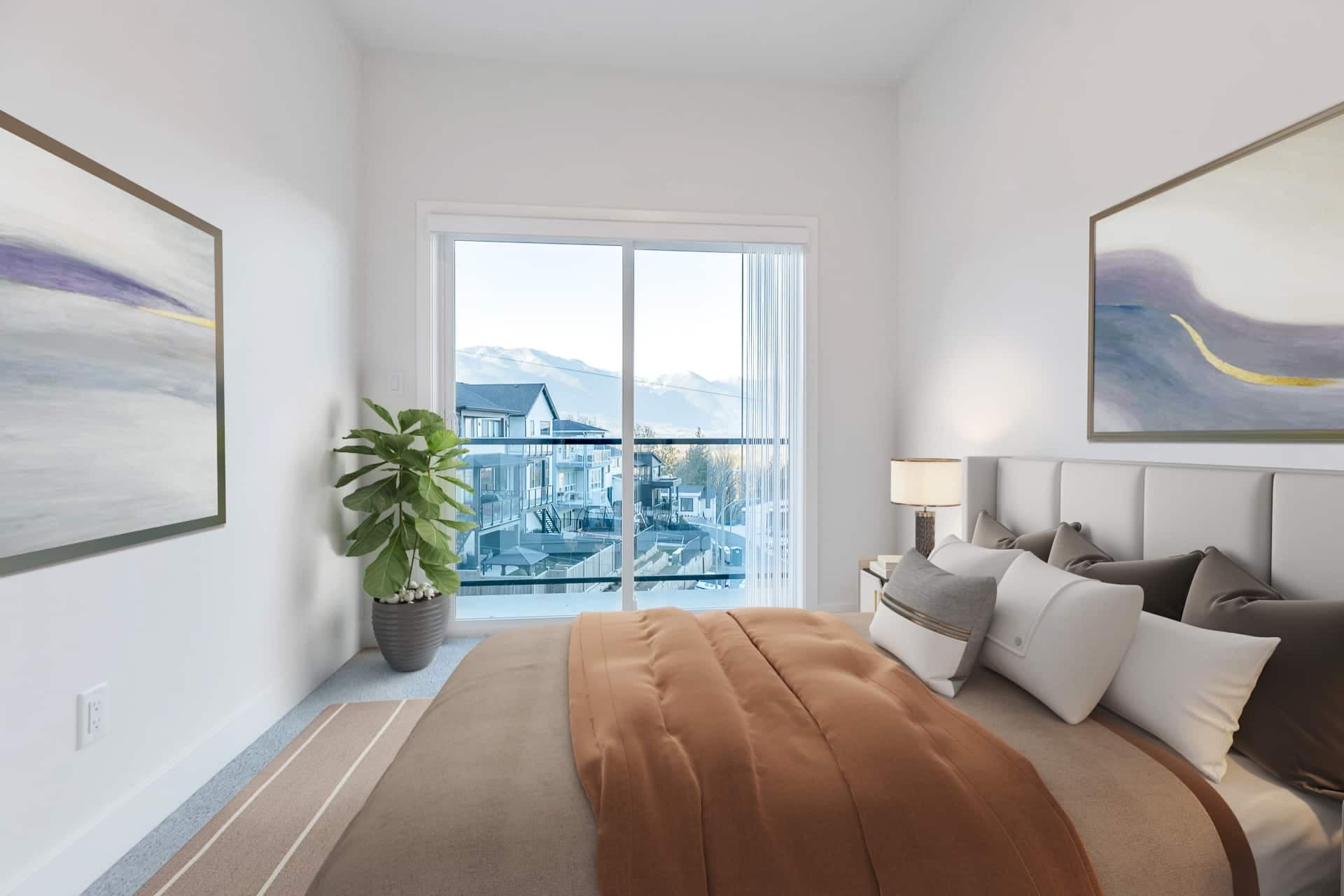Osprey Ridge – Bedroom with a rust-colored bedspread, framed abstract art, and a sliding glass door showing a mountain and neighborhood view.