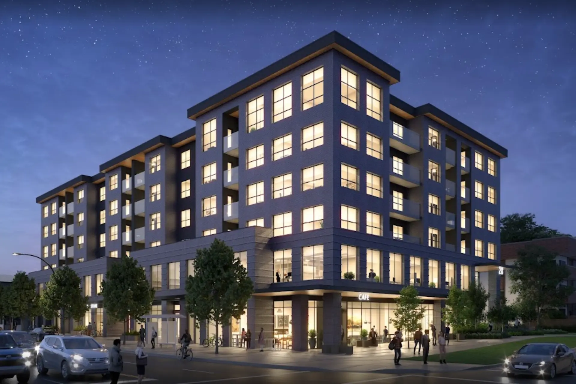 Lennox – Night rendering of a mid-rise building with lit windows, balconies, and a ground-floor cafe on a city street corner.