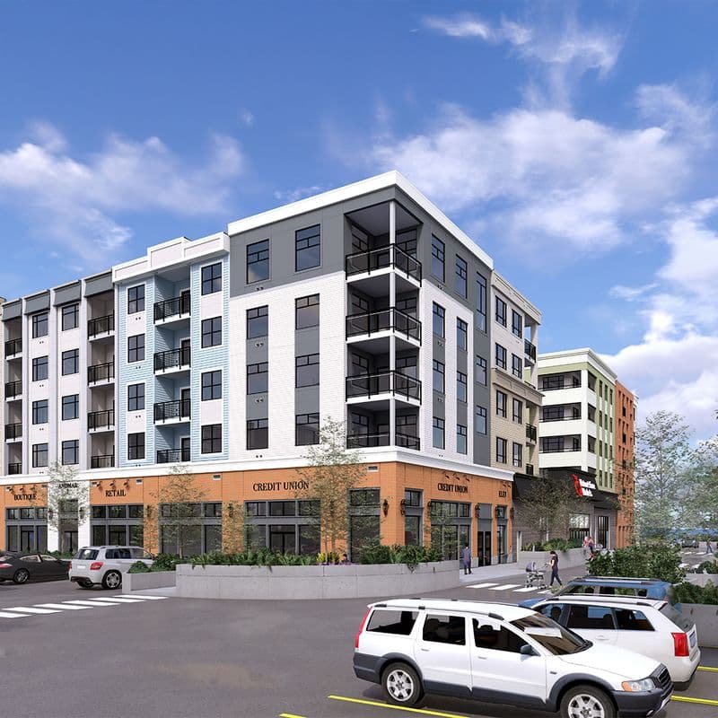 Andmar – Street-level view of a mixed-use building with ground-floor retail including a credit union and 'Andmar Boutique Retail'.