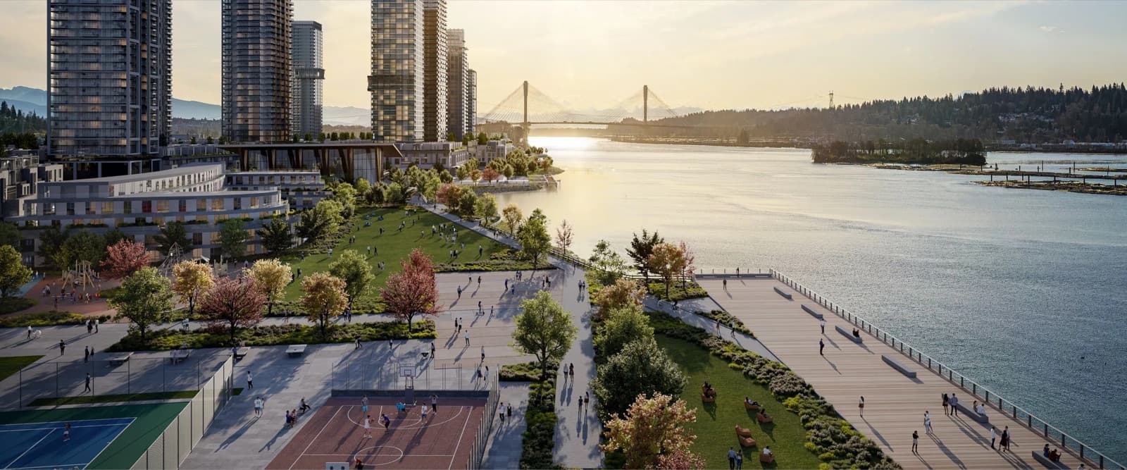 Debut – Elevated view of nearby high-rise towers and a riverfront park with sports courts and a boardwalk, with a cable-stayed bridge across the water.