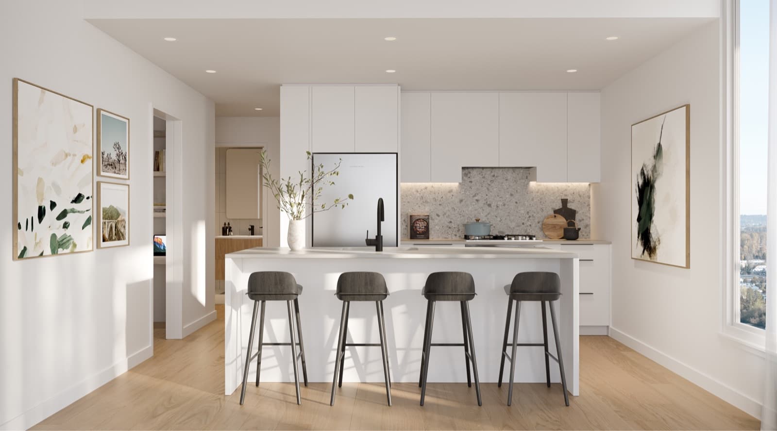 Debut – White kitchen with a large island, four dark bar stools, terrazzo backsplash, and framed art on the surrounding walls.