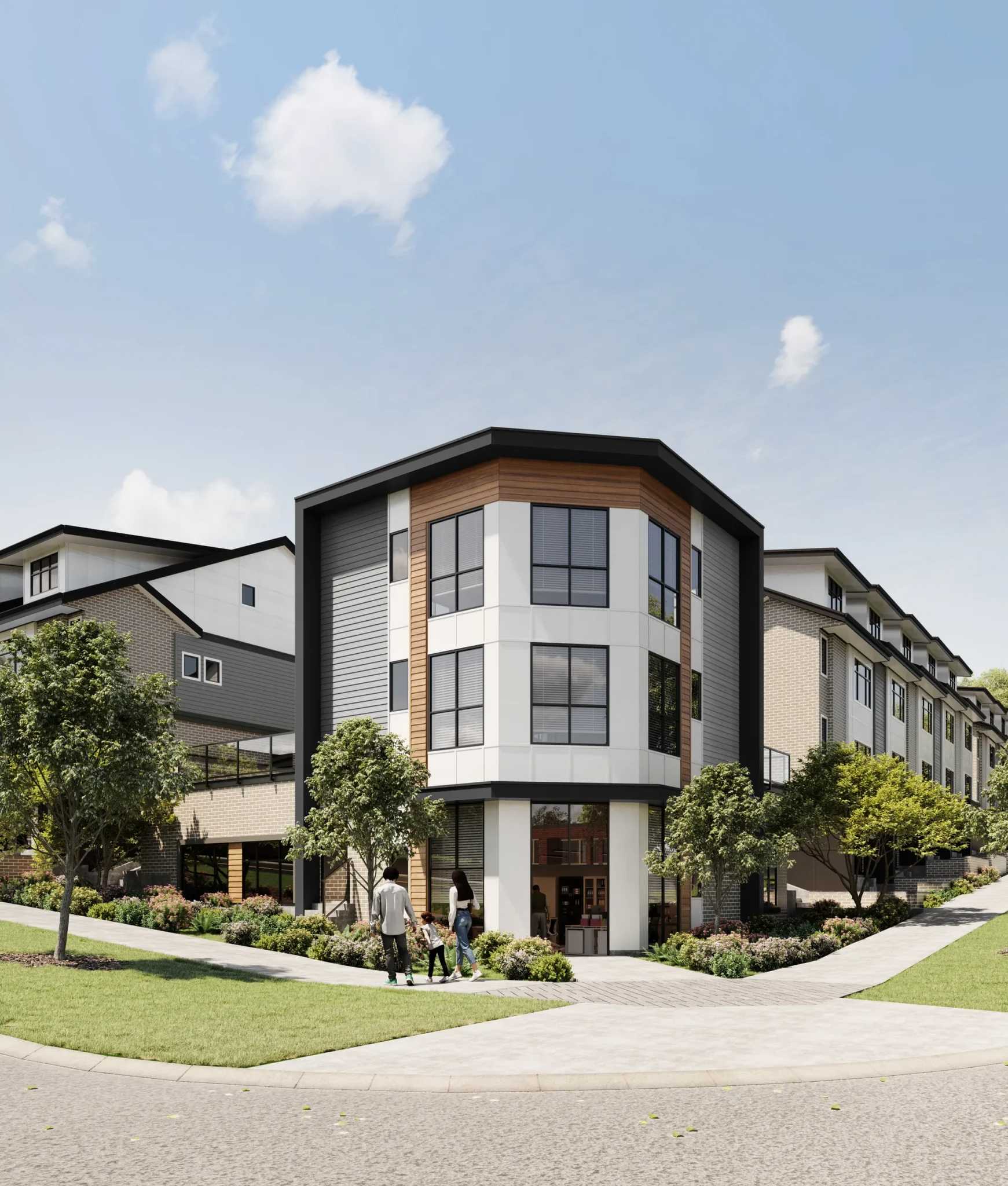 Goldstone – A modern multi-story residential building features a prominent angled corner facade finished with white panels, warm wood cladding, grey siding, and dark trim. Landscaped concrete walkways with green lawns, trees, and flowering shrubs wrap around the building under a bright, sunny daytime sky.