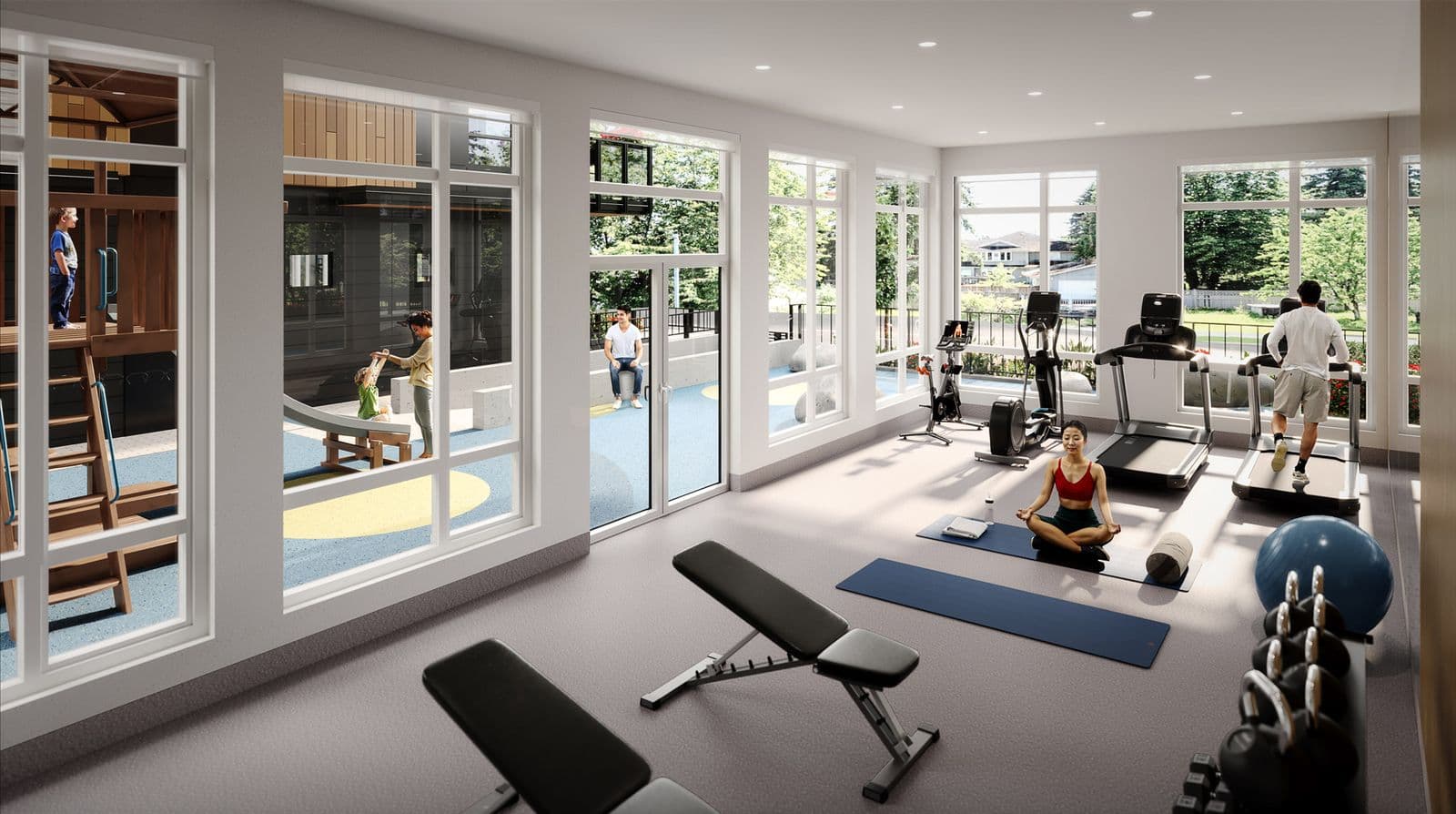 Kestrel – Building fitness room with treadmills, an elliptical, a stationary bike, weight bench and dumbbells, overlooking an outdoor kids' play area through large windows.