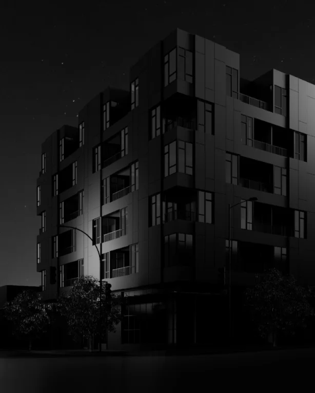 W16 by Olson Kundig – A black-and-white low-angle exterior shot of a modern multi-story residential building at night under a clear, starry sky. Streetlights illuminate portions of the dark panelled facade, highlighting recessed balconies and street-level trees along the sidewalk.