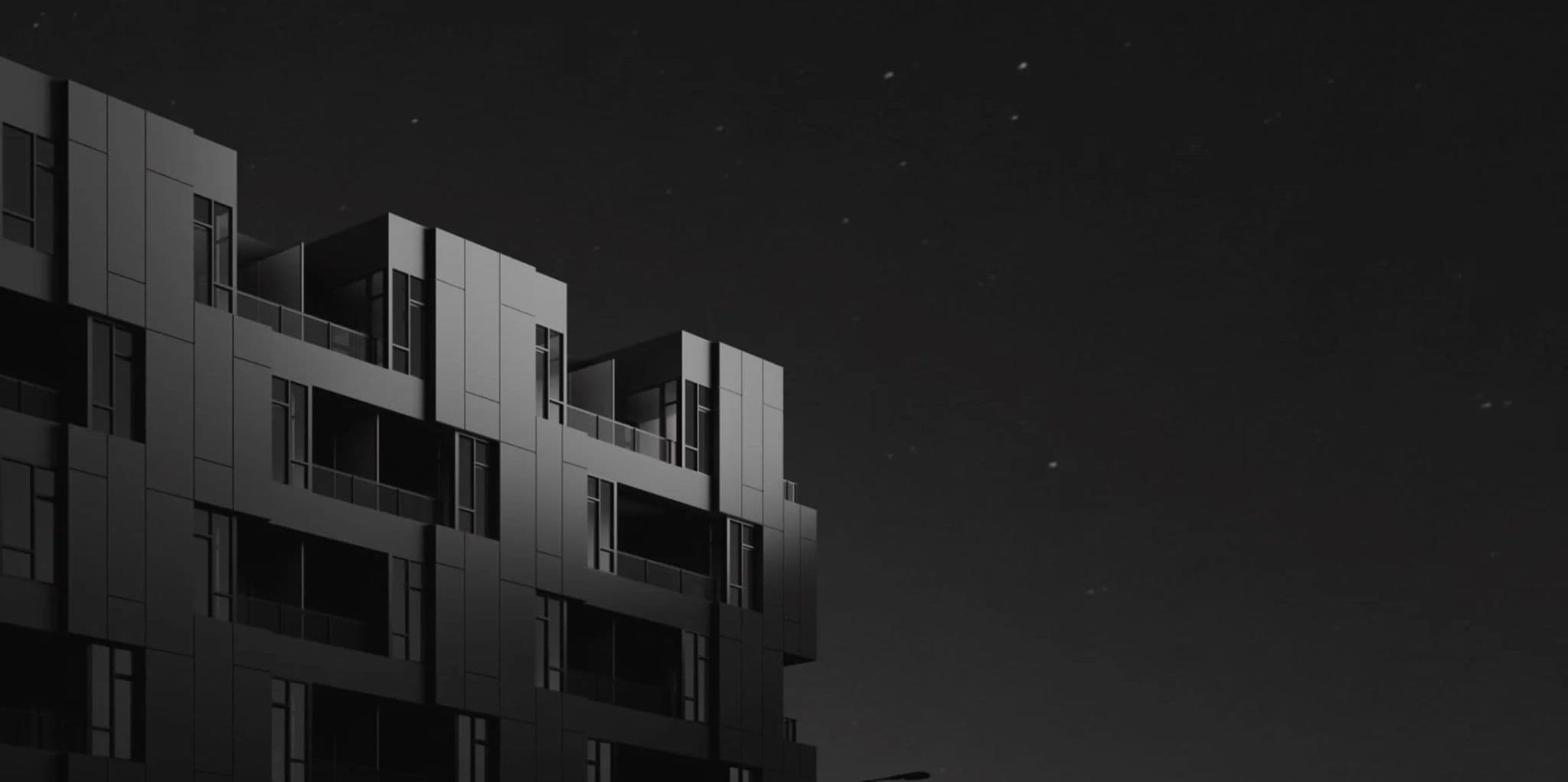 W16 by Olson Kundig – A black-and-white low-angle shot showcases the modern geometric facade of a residential building, featuring paneling, recessed balconies, and tall windows. The structure is set against a dark, subtle night sky dotted with faint stars.