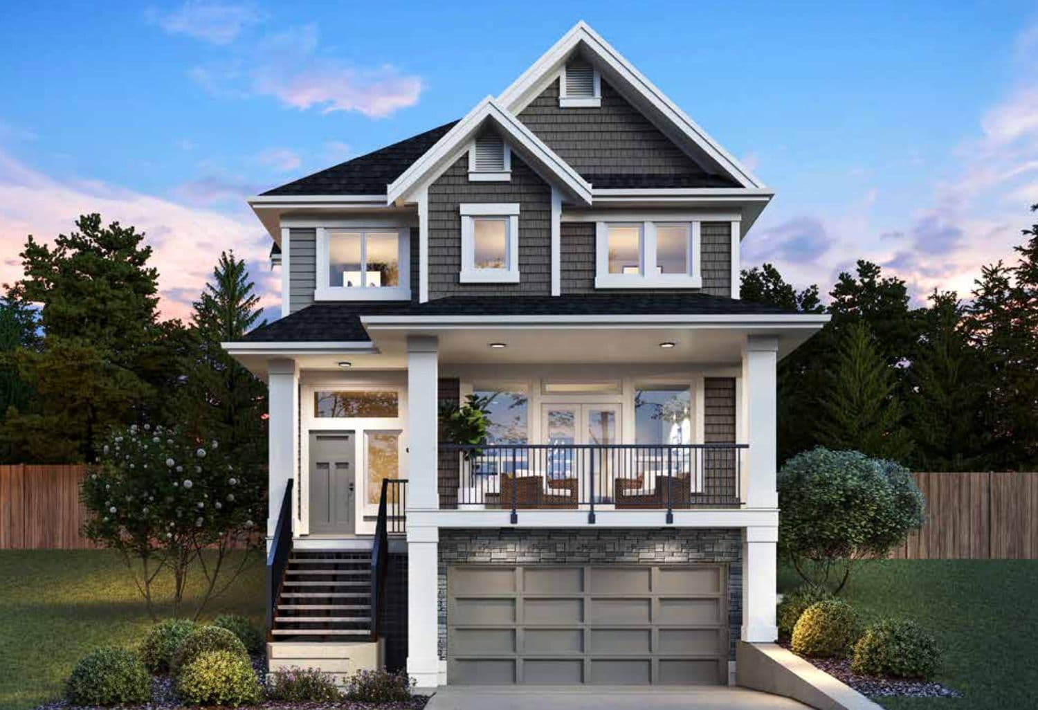 Sharpewood Hills – Two-story craftsman-style show home at dusk with gray shake siding, a covered front porch with outdoor seating, and an attached double garage below.