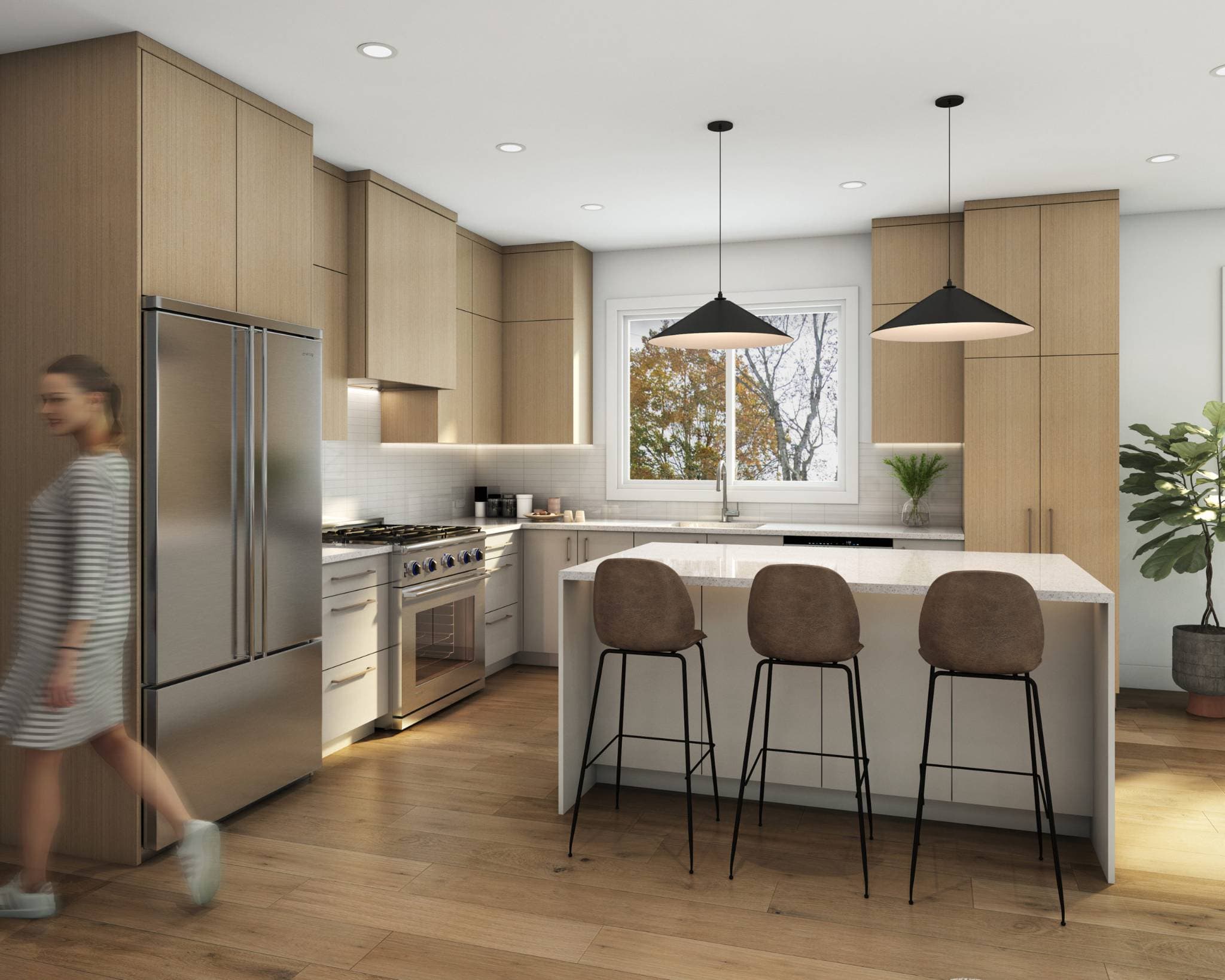 Ebor Plateau – A modern, sunlit kitchen featuring light wood cabinetry, stainless steel appliances, and a central white waterfall island with three barstools. Two black pendant lights hang above the island, with a window framing autumn foliage in the background and a blurred figure walking by.