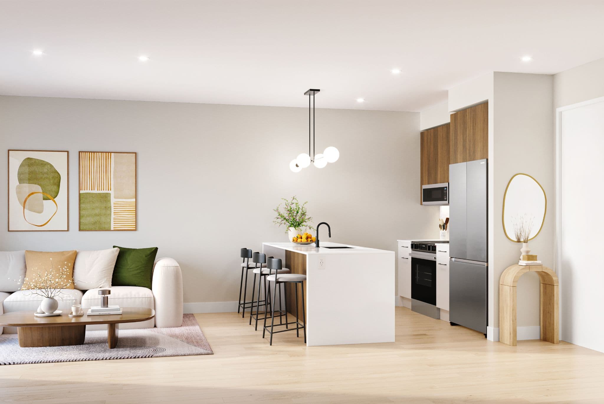 Aria 2 – Open-concept living room and kitchen with a beige sectional sofa, wall art, and a white island with barstools.