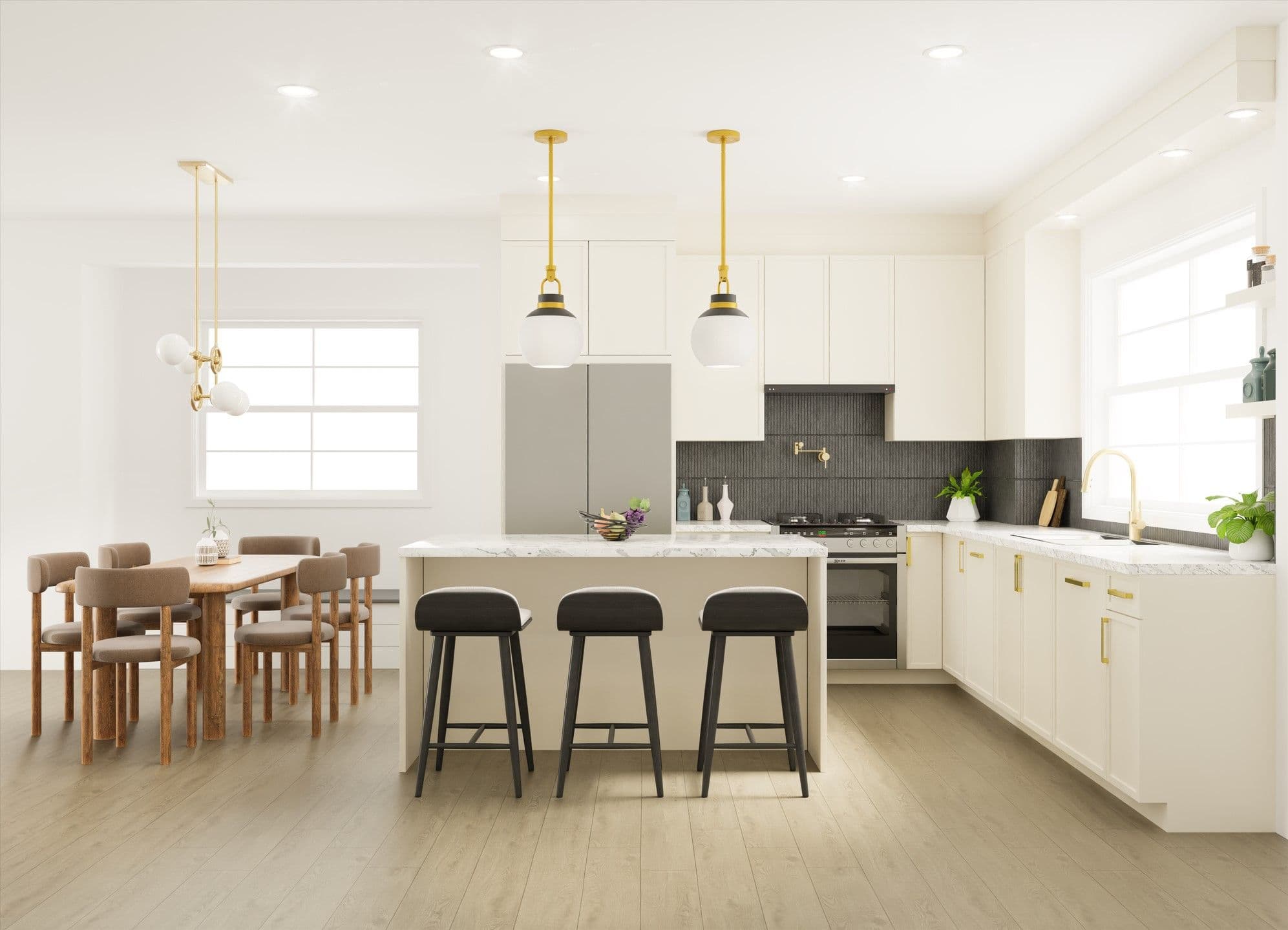 Fiore – A modern open-concept kitchen and dining area featuring off-white cabinetry, brass hardware, a marble waterfall island with three black barstools, and a dark tile backsplash. To the left, a light wood dining table with upholstered chairs sits under a brass chandelier, all set on light-toned hardwood floors.