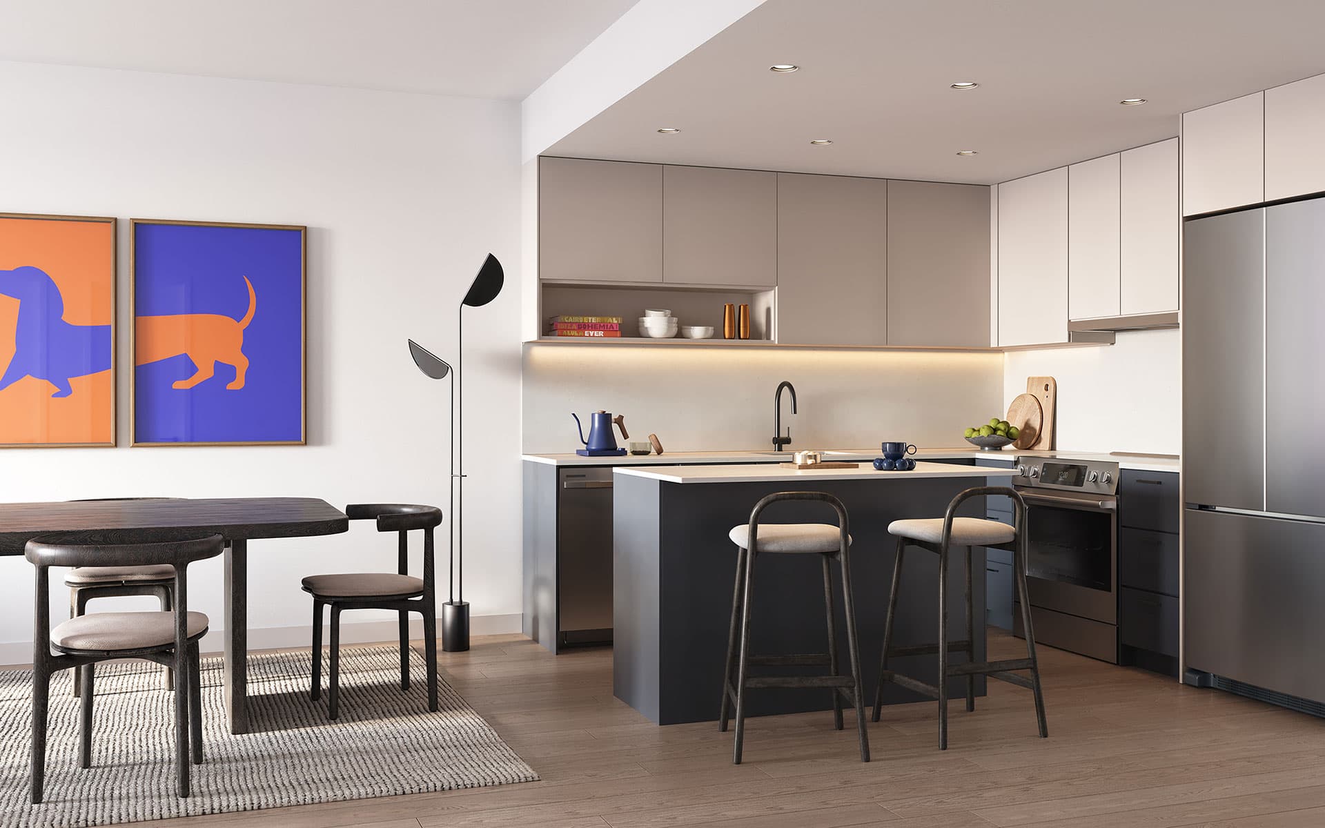Matteō – Kitchen with dark navy island and lower cabinets, light upper cabinets, wood bar stools, and a stainless range and fridge, open to a dining area with pop-art dog prints.