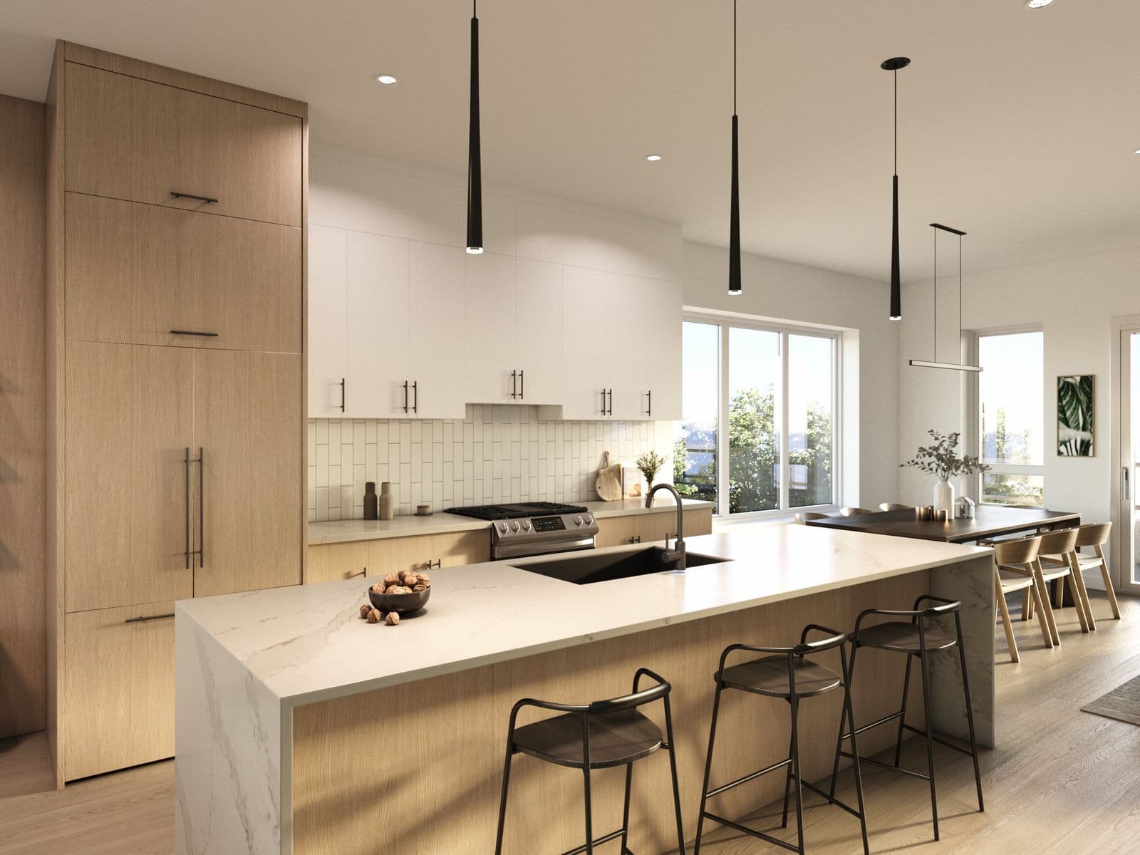 Oxford Mews – Rendering of a kitchen island with pendant lighting, gas range, and dining table in the background.