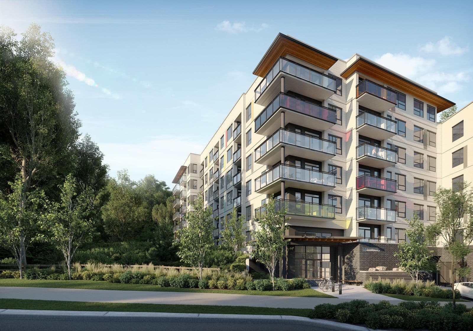 Hue – Daytime rendering of a cream-colored mid-rise condo building corner with wood-topped balconies, labeled 125 Albert Street.