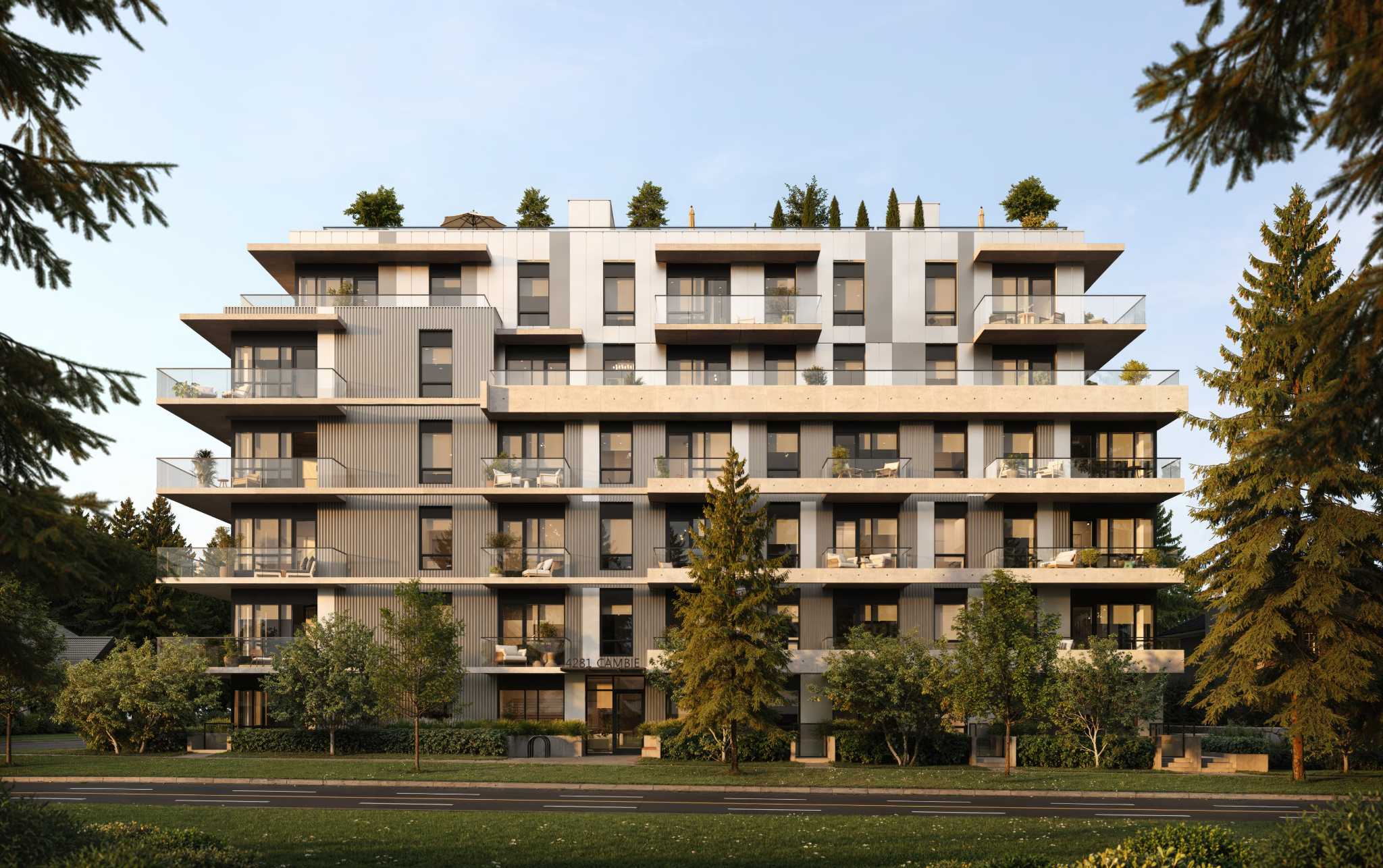 Arden – A modern, mid-rise residential building with grey panelling, concrete balconies with glass railings, and rooftop greenery, set against a backdrop of mature pine trees. The street-level view shows a clear, sunny day with soft warm light illuminating the facade and surrounding landscaped lawn.