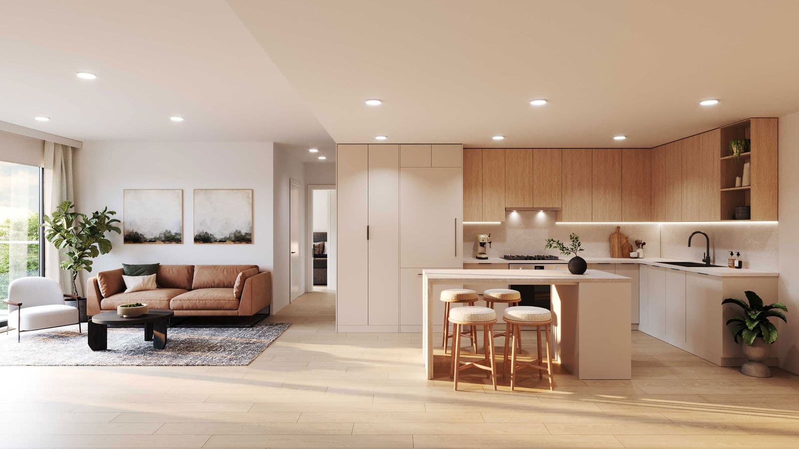 Mary Annes Place – An open living room and kitchen with a brown leather sofa, dark coffee table, wood cabinetry, and a kitchen island with stools.