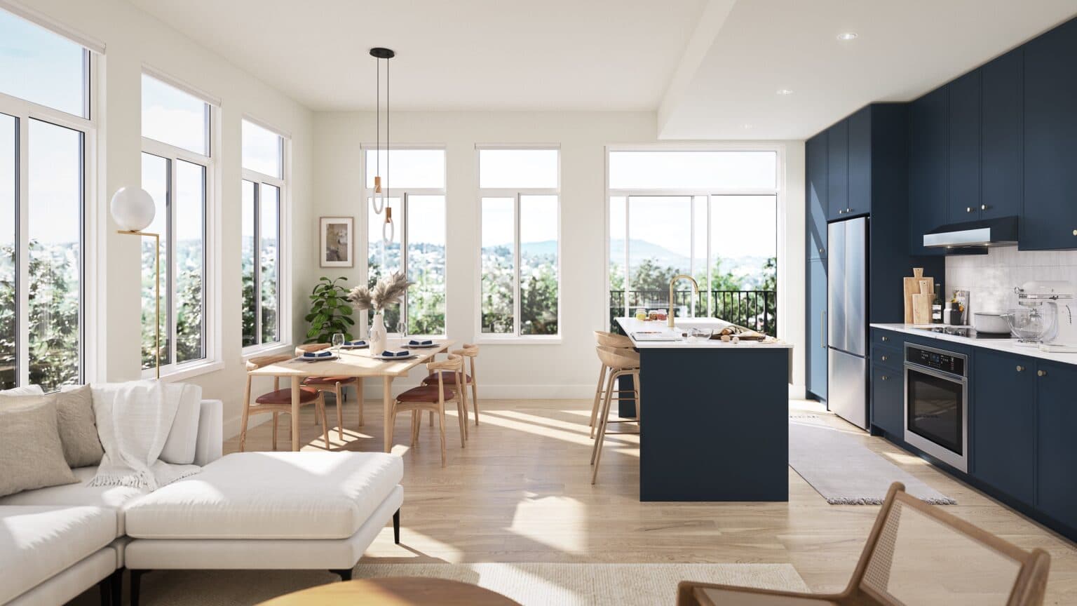 Allison West – A bright, open-concept living area featuring dark navy kitchen cabinetry, a matching island with bar seating, and a light wood dining table set under natural sunlight. Large windows surround the space, offering views of distant green hills and a residential neighborhood under a clear daytime sky.