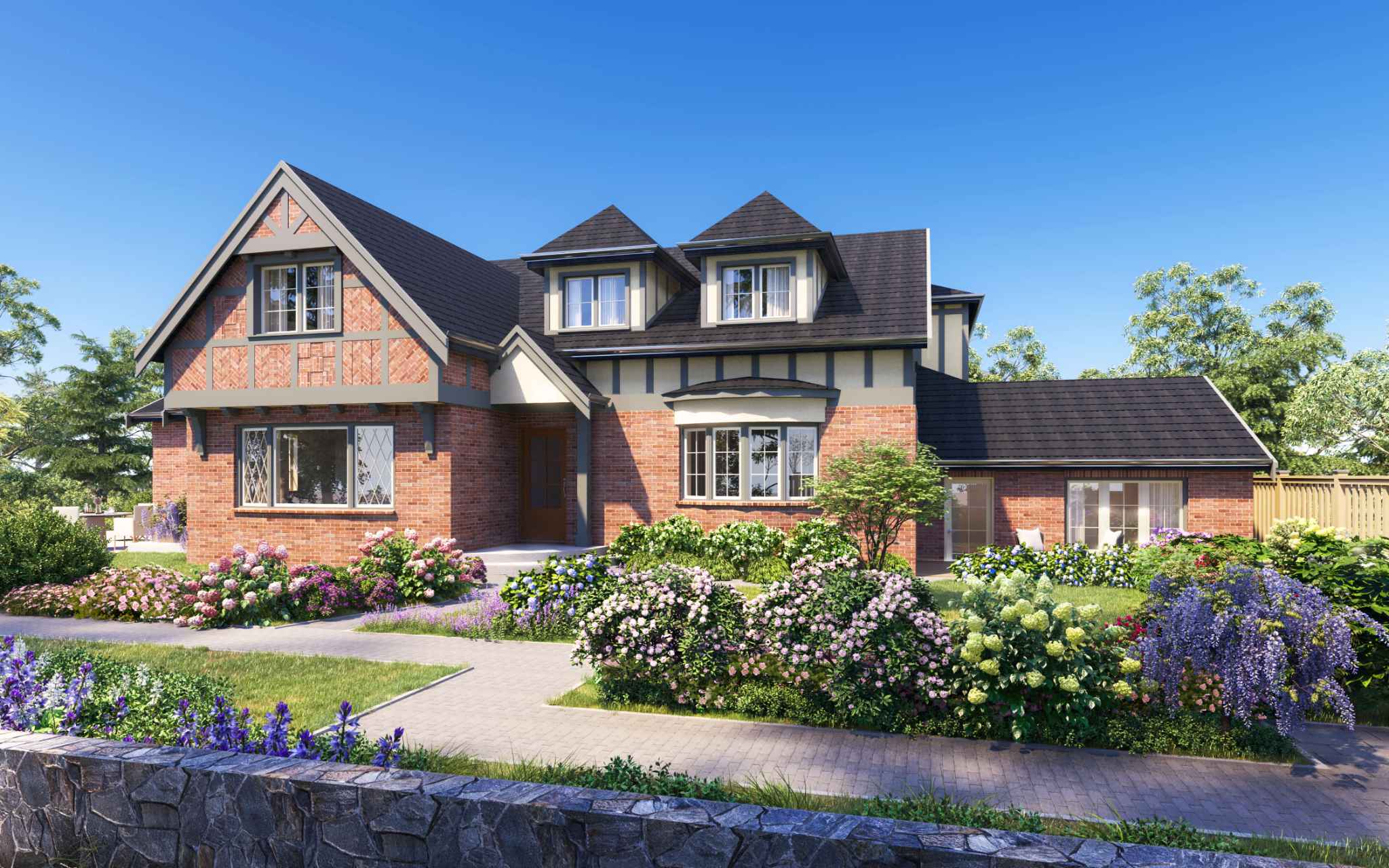 Harlowe House – An exterior rendering of a Tudor-style brick house with dark shingle gabled roofs, dormer windows, and half-timbered accents under a clear blue sky. A paved garden walkway leads past vibrant flowering bushes, hydrangeas, and a low stone wall toward the front entrance.