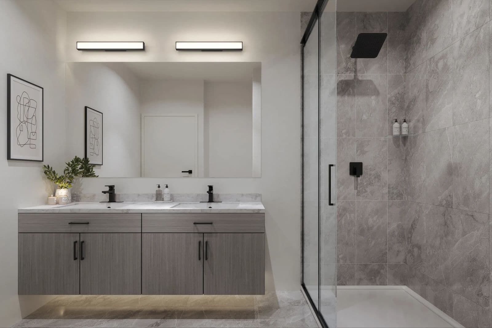 Rouge Townhomes – Rendering of a bathroom with a grey double vanity, large mirror, and an adjoining glass-enclosed shower with grey stone-look tile.