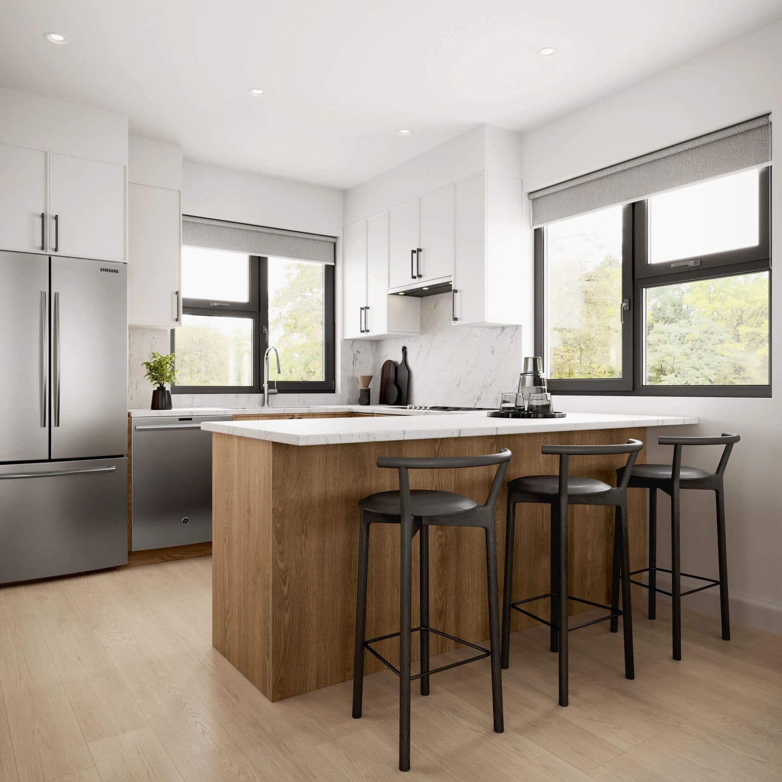 Rouge Townhomes – Rendering of a white kitchen with a wood island, black bar stools, stainless fridge and dishwasher, and marble backsplash between two large windows.