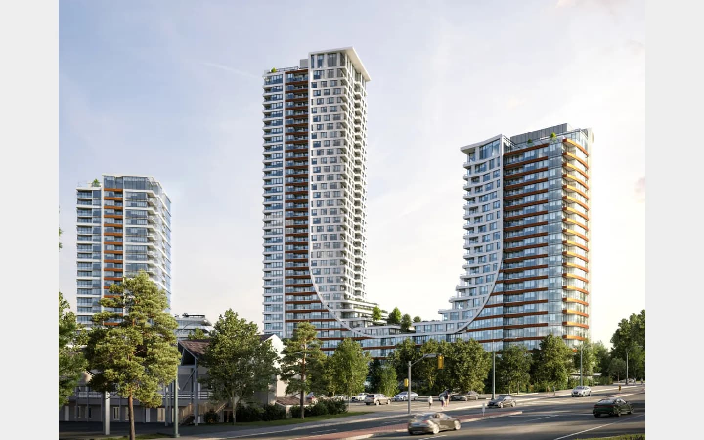 BridgeCity – A ground-level street view rendering showcases modern high-rise residential towers with white facades, glass balconies, and warm wood accents. The central building features a distinctive swooping, U-shaped architectural curve connecting two towers above lush greenery and a paved roadway with light traffic under a clear sky.