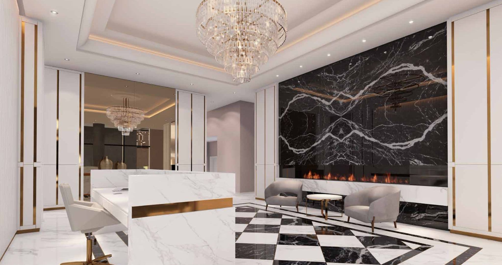 Millennium Central Lonsdale Condos – An upscale lobby lounge with a large black-and-white marble fireplace wall, checkerboard marble flooring, and a chandelier over a concierge desk.