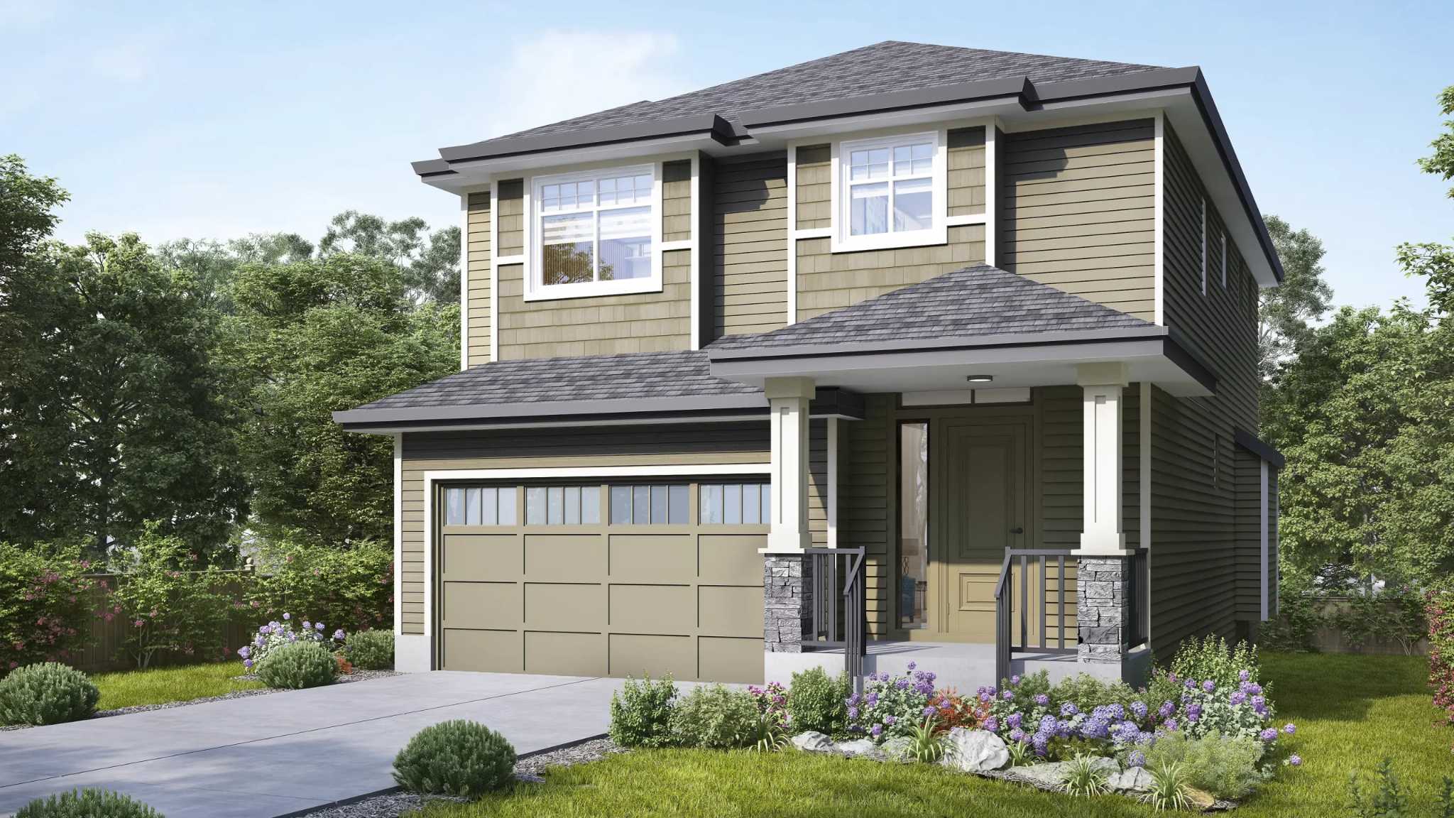 Bloom at Yorkson – A ground-level exterior rendering of a two-storey single-family home featuring tan horizontal siding, shake accents, and a covered front porch supported by stone-based pillars. A concrete driveway leads to an attached single-car garage, bordered by manicured lawn and vibrant purple flower beds under bright daylight.