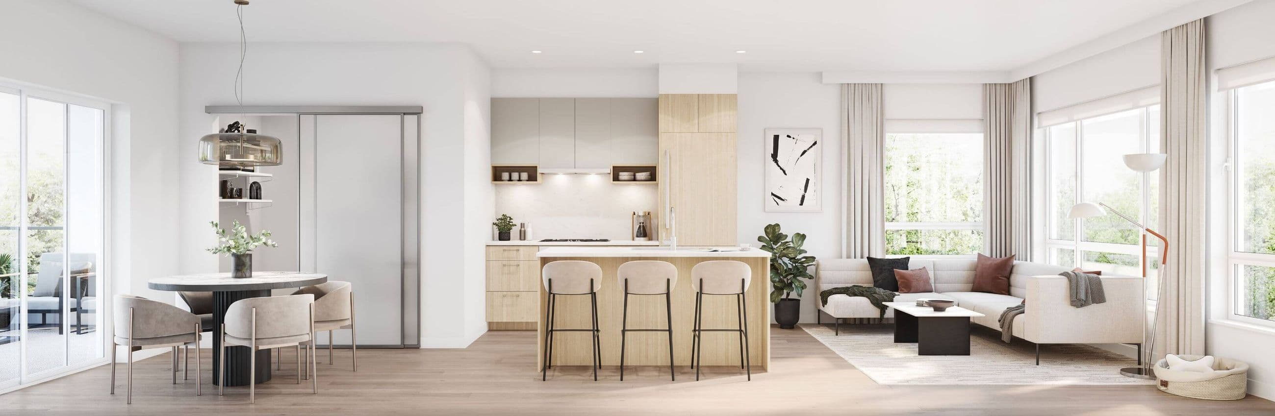 Astrid – A brightly lit, open-concept living space features light wood floors, a dining table with upholstered chairs, a central kitchen island with three barstools, and a beige sectional sofa near large windows filled with daylight. Flat-panel wood cabinetry, integrated appliances, and clean neutral finishes give the suite a modern, airy aesthetic.