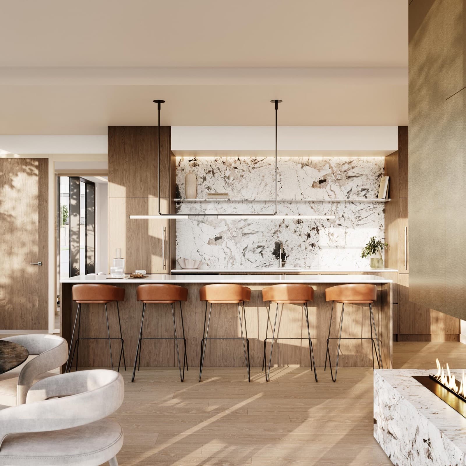 Chapter – Kitchen with a marble slab backsplash, wood cabinetry, leather bar stools, and a linear fireplace edge visible in the foreground.