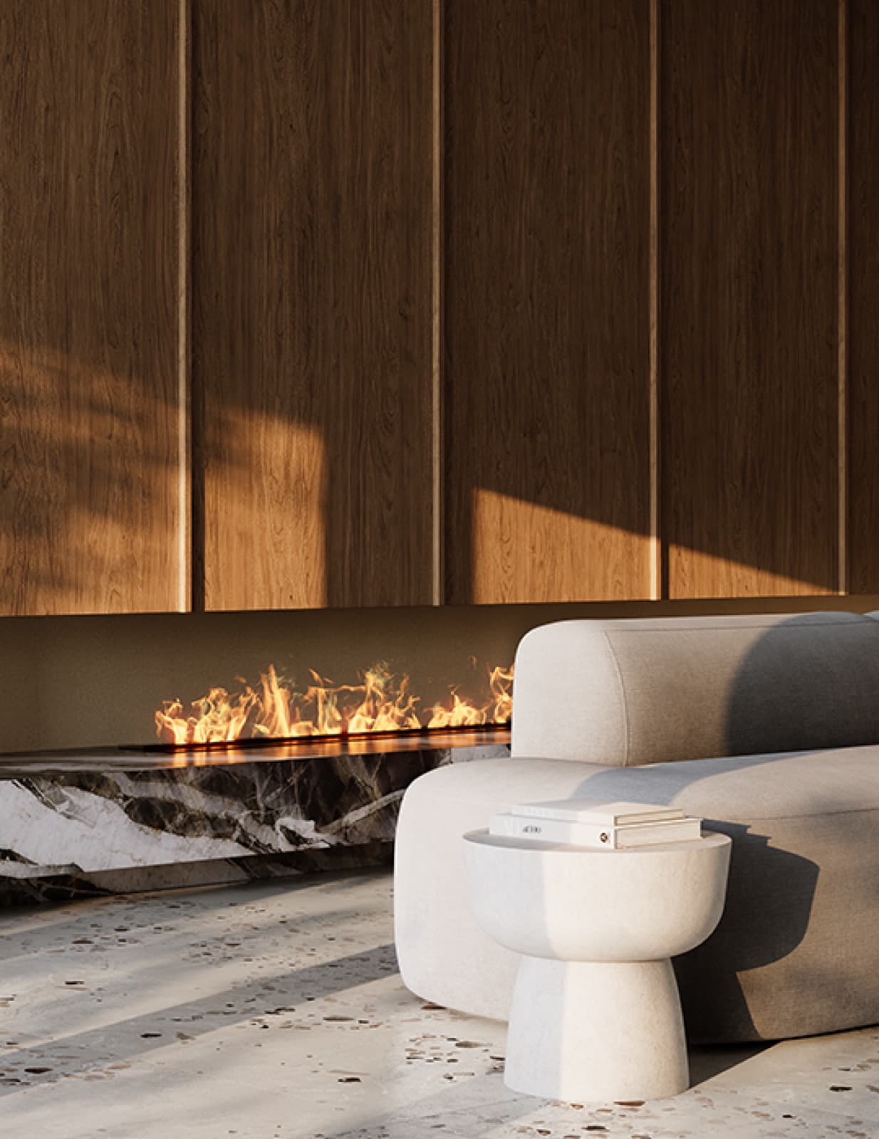 Chapter – Close-up of a lounge area with a linear gas fireplace, wood paneled wall, a light sofa, and a round side table.