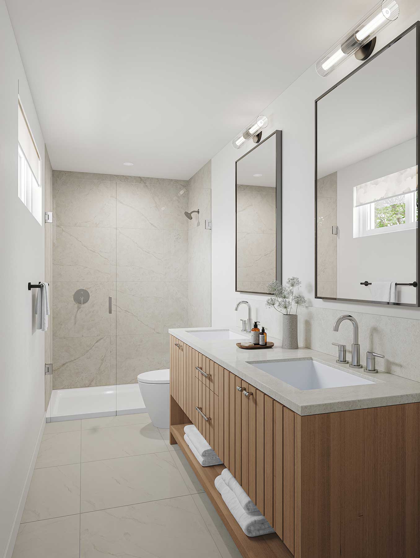 Trailside Milner – Long bathroom with a wood double vanity, two rectangular undermount sinks, tall mirrors, a walk-in shower with marble-look tile, and a separate toilet area.