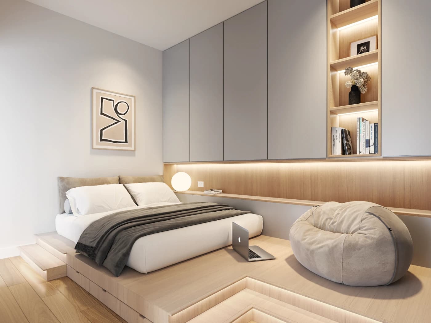 Piano – A modern minimalist bedroom featuring a bed integrated into a multi-tiered, light wood raised platform with under-step LED lighting. The space includes full-height grey built-in cabinetry, an illuminated wood-lined display niche, and a cozy beanbag lounge area beside the bed.