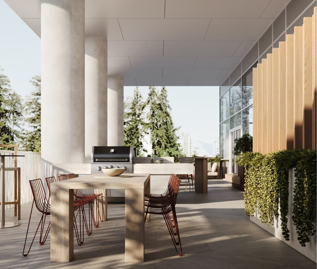Ethos – A covered outdoor terrace featuring a light wood dining table with thin red wire chairs, a stainless steel barbecue grill built into a concrete counter, and tall round support columns. Lush trailing greenery sits in a planter box alongside warm vertical wood slat siding, looking out onto tall pine trees and a distant cityscape under bright daylight.