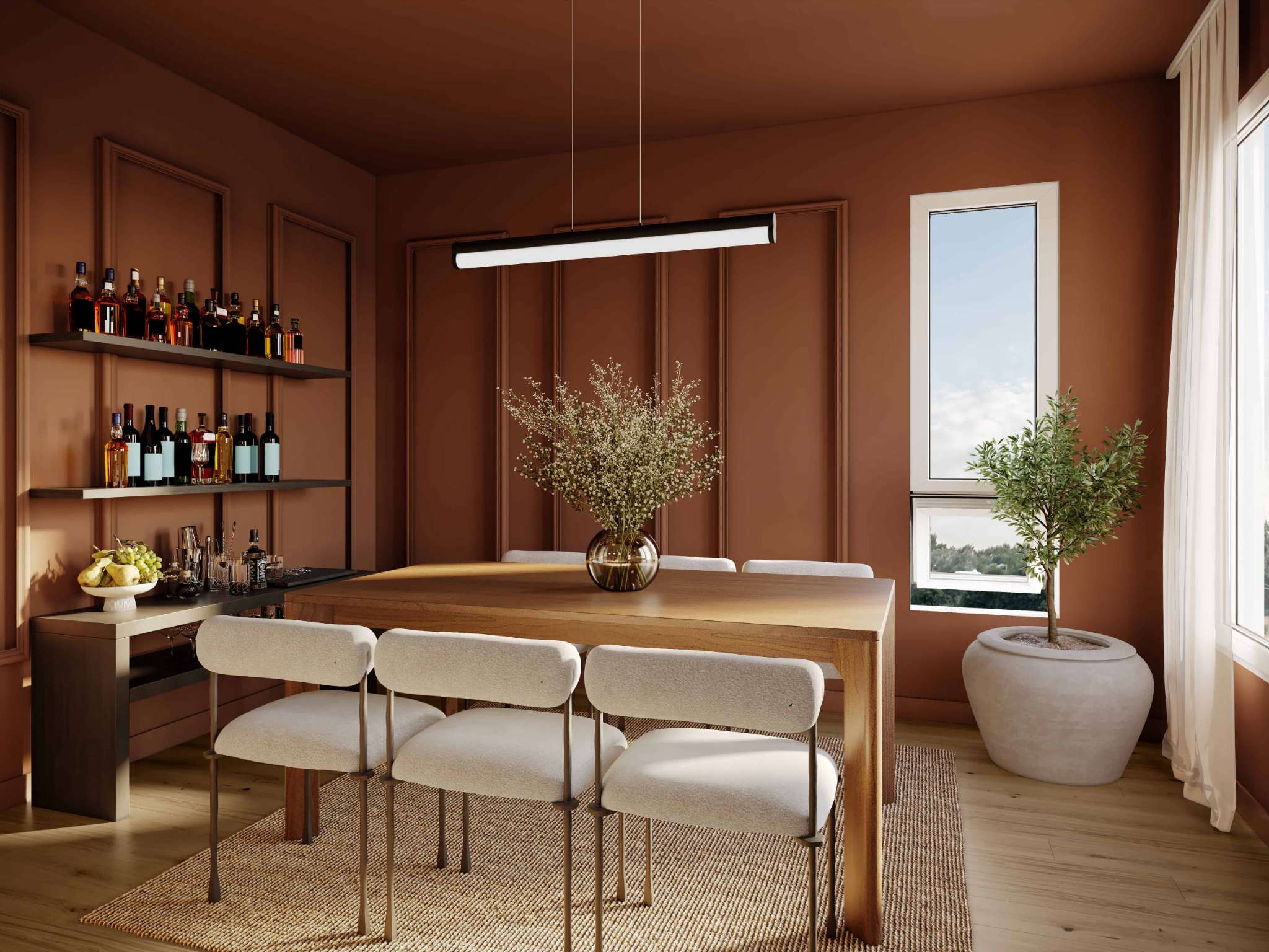 Eden Townhomes – A dining room with terracotta-colored walls, a wood dining table with white upholstered chairs, and open shelving stocked with bottles.