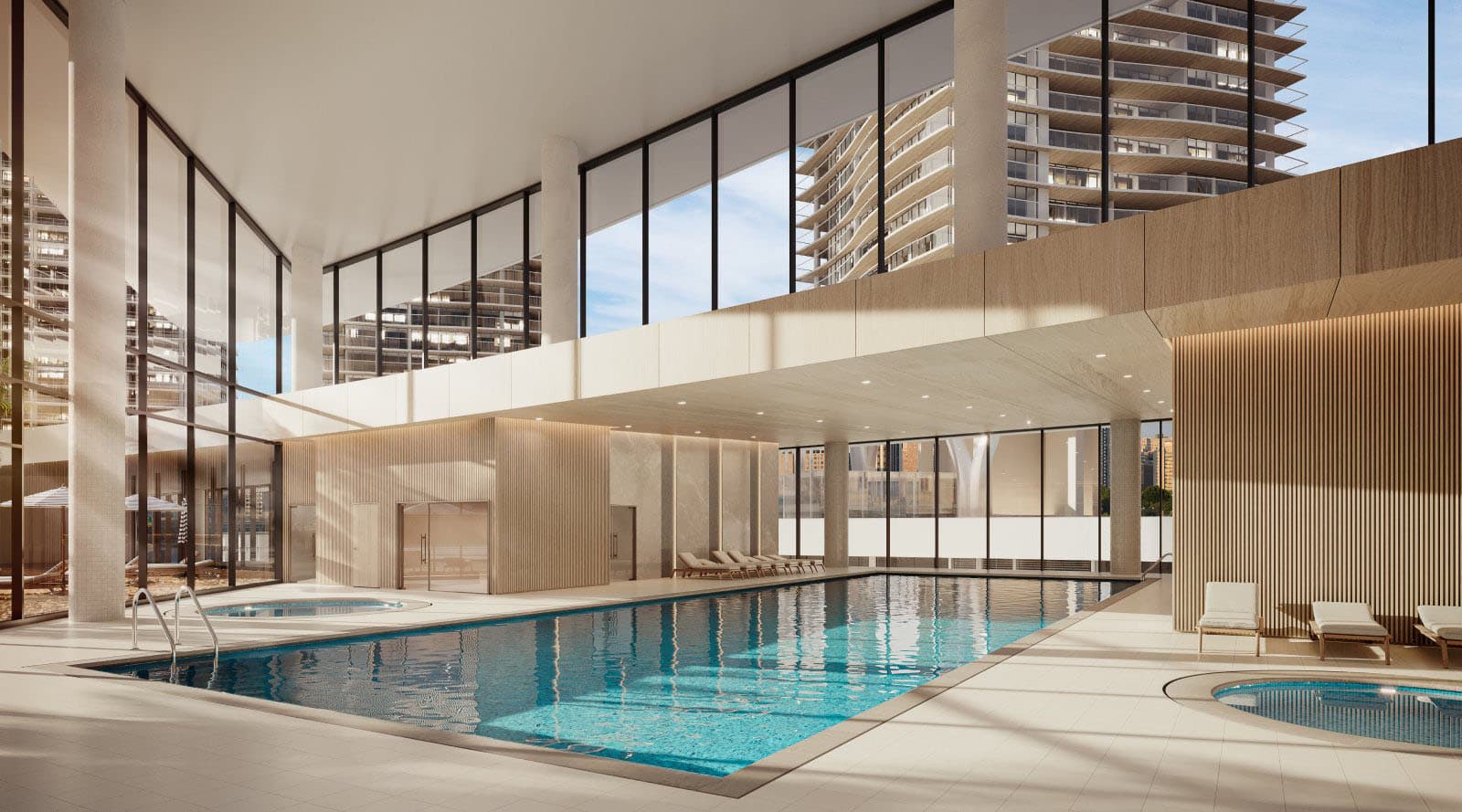 Circle at Concord Brentwood – Rendering of an indoor pool and hot tubs with lounge chairs, surrounded by glass walls looking out to city high-rises.