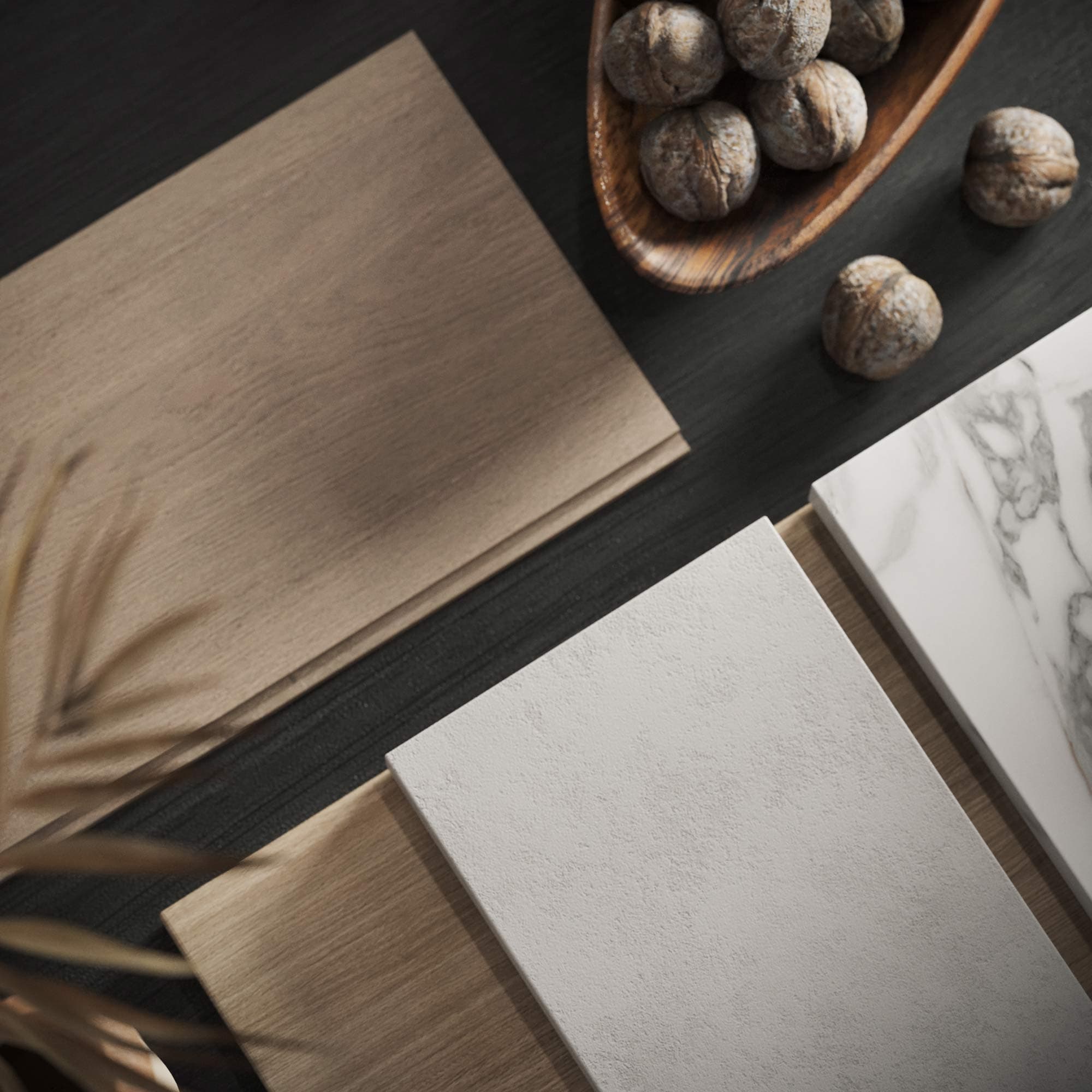 Elisa at Sunnyside Park – Flat-lay of interior finish and material samples (wood veneer, stone, marble) styled with walnuts.