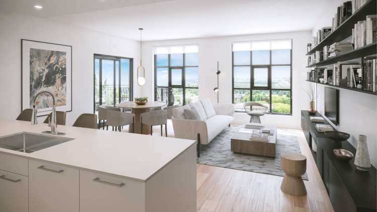 Salisbury Green – Open-concept kitchen, dining, and living room rendering with a white kitchen island, dining table, grey sofa, and large windows overlooking a city and treed landscape.