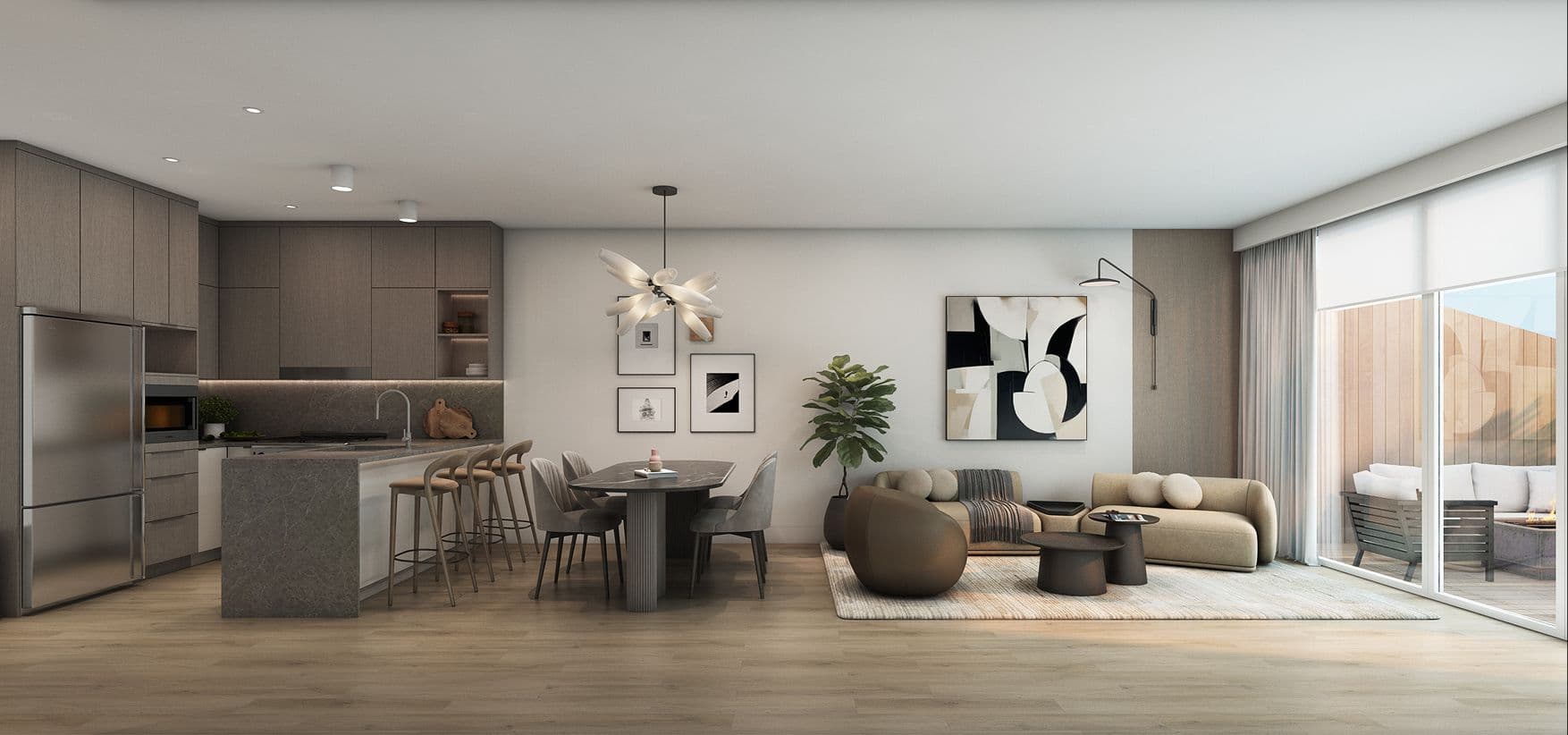 Kingsgate – An open-concept living space features light wood flooring, a sleek kitchen with grey cabinetry and a stone island, and an adjacent dining table under a sculptural pendant light. The living area is furnished with curved neutral-toned seating and abstract art, with large sliding glass doors opening out onto a sunlit private patio.