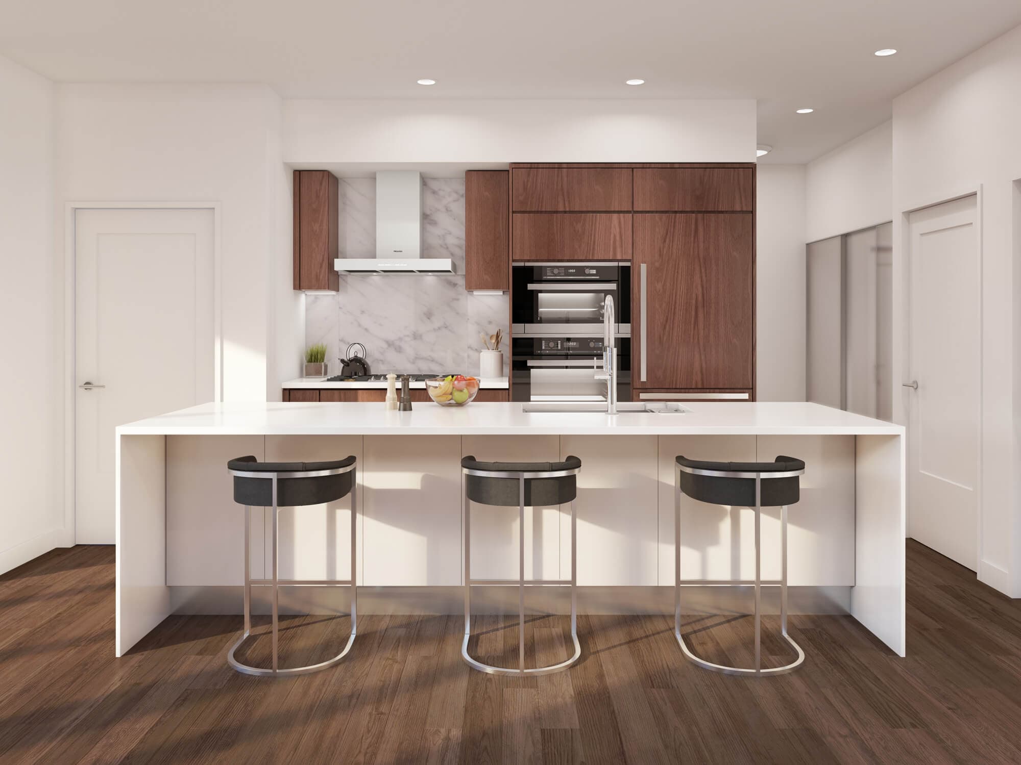 The Arbutus – Same kitchen layout shown with a dark walnut cabinet finish option, marble backsplash, built-in ovens, and dark upholstered bar stools.