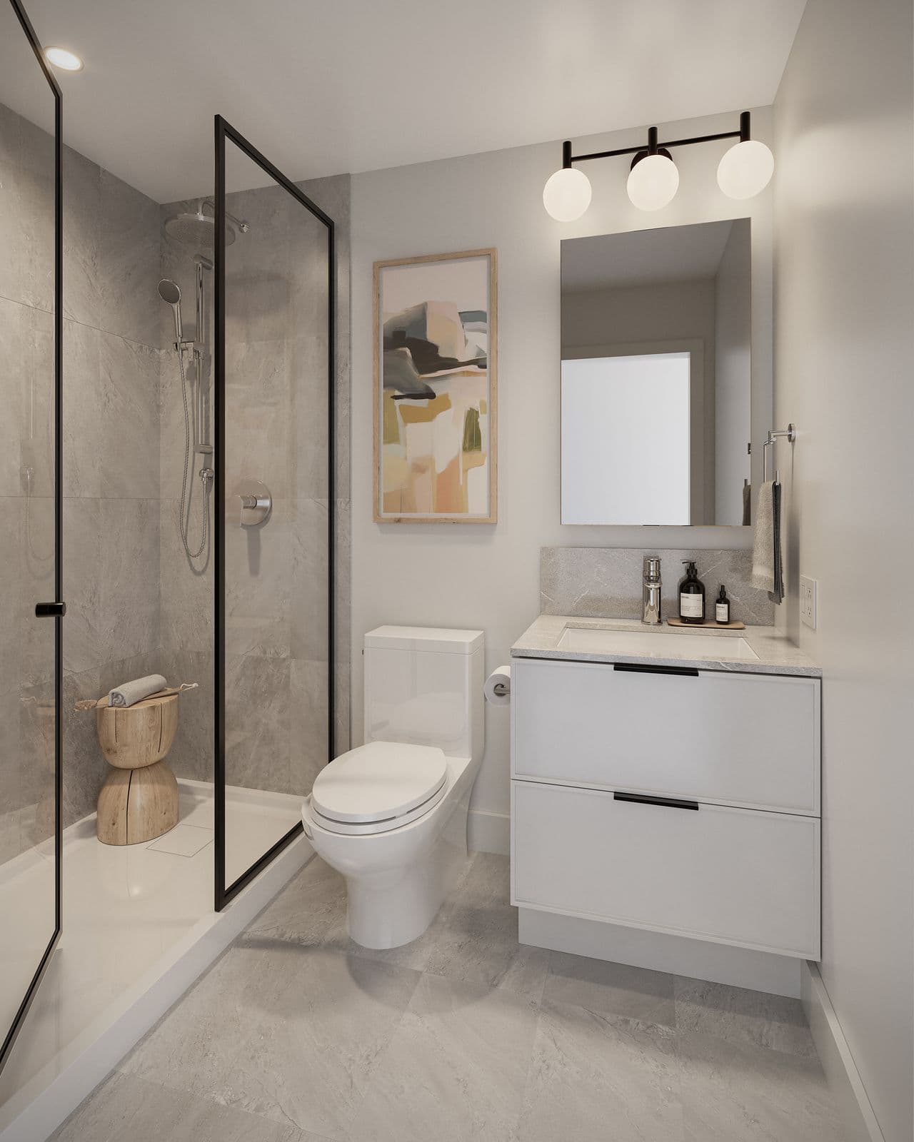 Spera – Bathroom with a glass-enclosed walk-in shower, wall art, a mirrored vanity with double sconces, and a toilet.