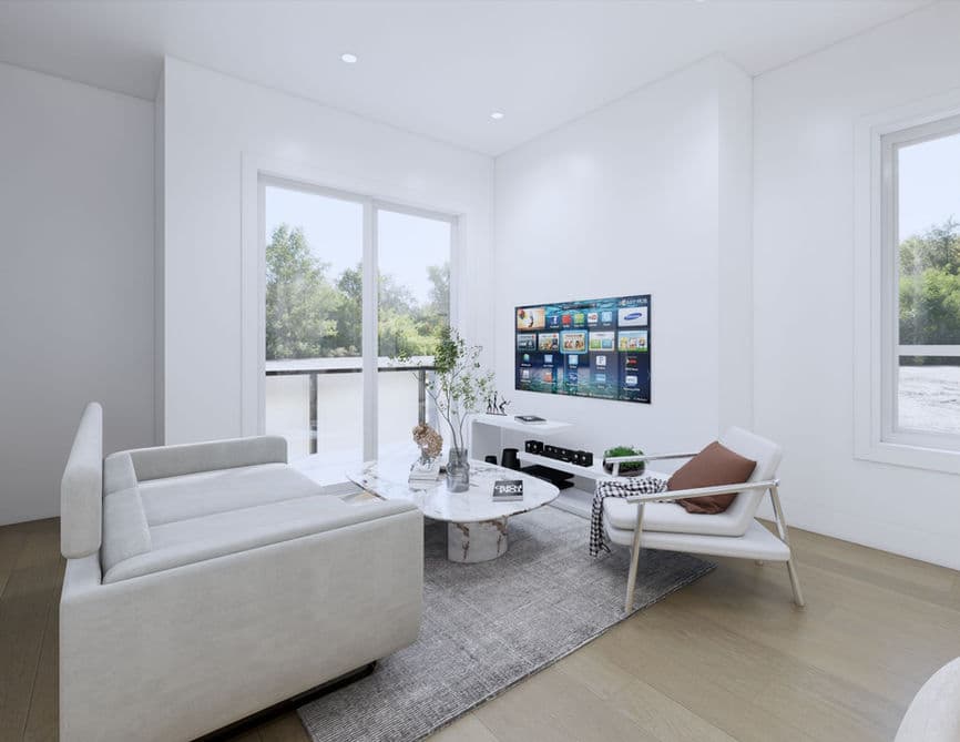 Clove – A bright, minimalist living room features light hardwood flooring, crisp white walls, and a light grey sofa facing a modern white accent chair and a marble coffee table. Sliding glass doors lead out to a balcony with views of lush green trees under daylight.