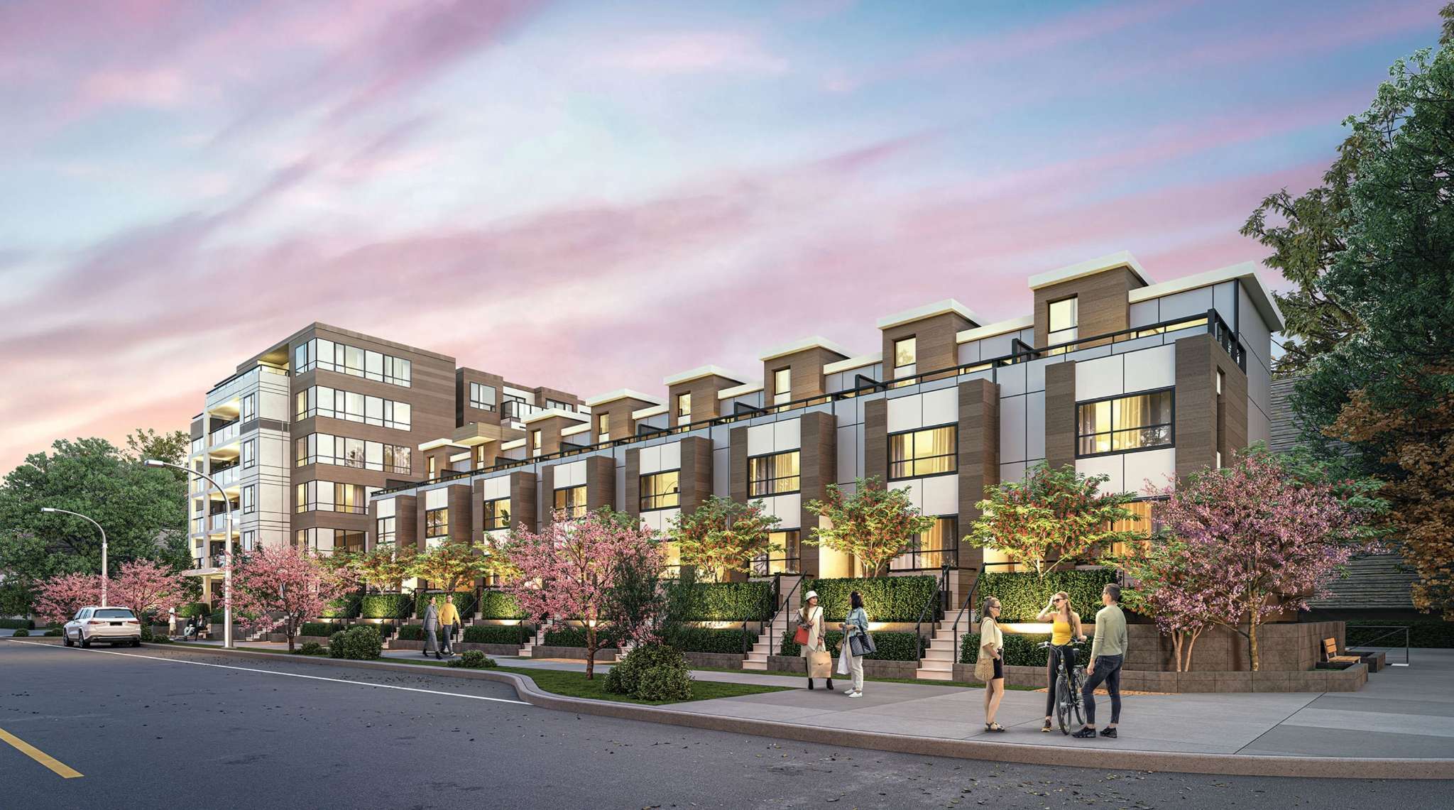 Luxio on the Park – A modern street-level rendering of multi-family townhomes and a low-rise residential building featuring wood-tone paneling, white cladding, and large windows set under a pastel dusk sky. Pedestrians walk along a sidewalk landscaped with pink cherry blossom trees, green hedges, and individual entry staircases.